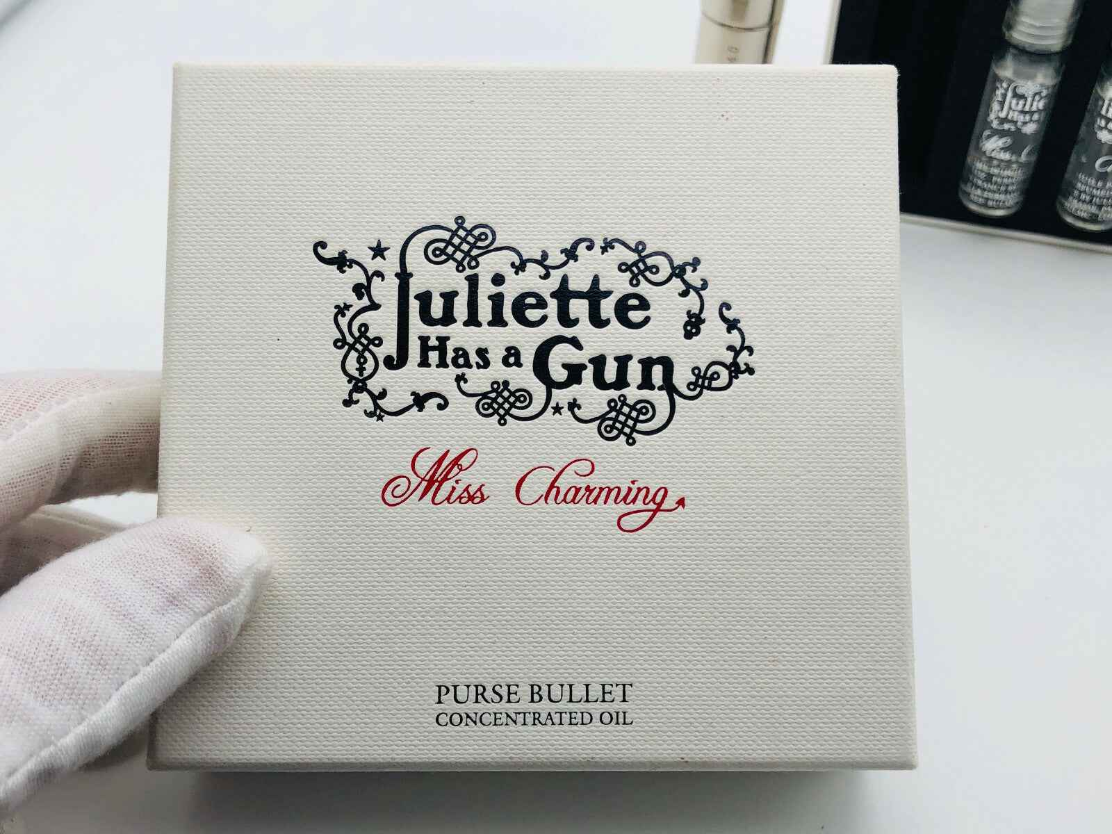 JULIETTE HAS A GUN MISS CHARMING PURSE BULLET CONCENTRATED OIL PROFUMO DE SAC