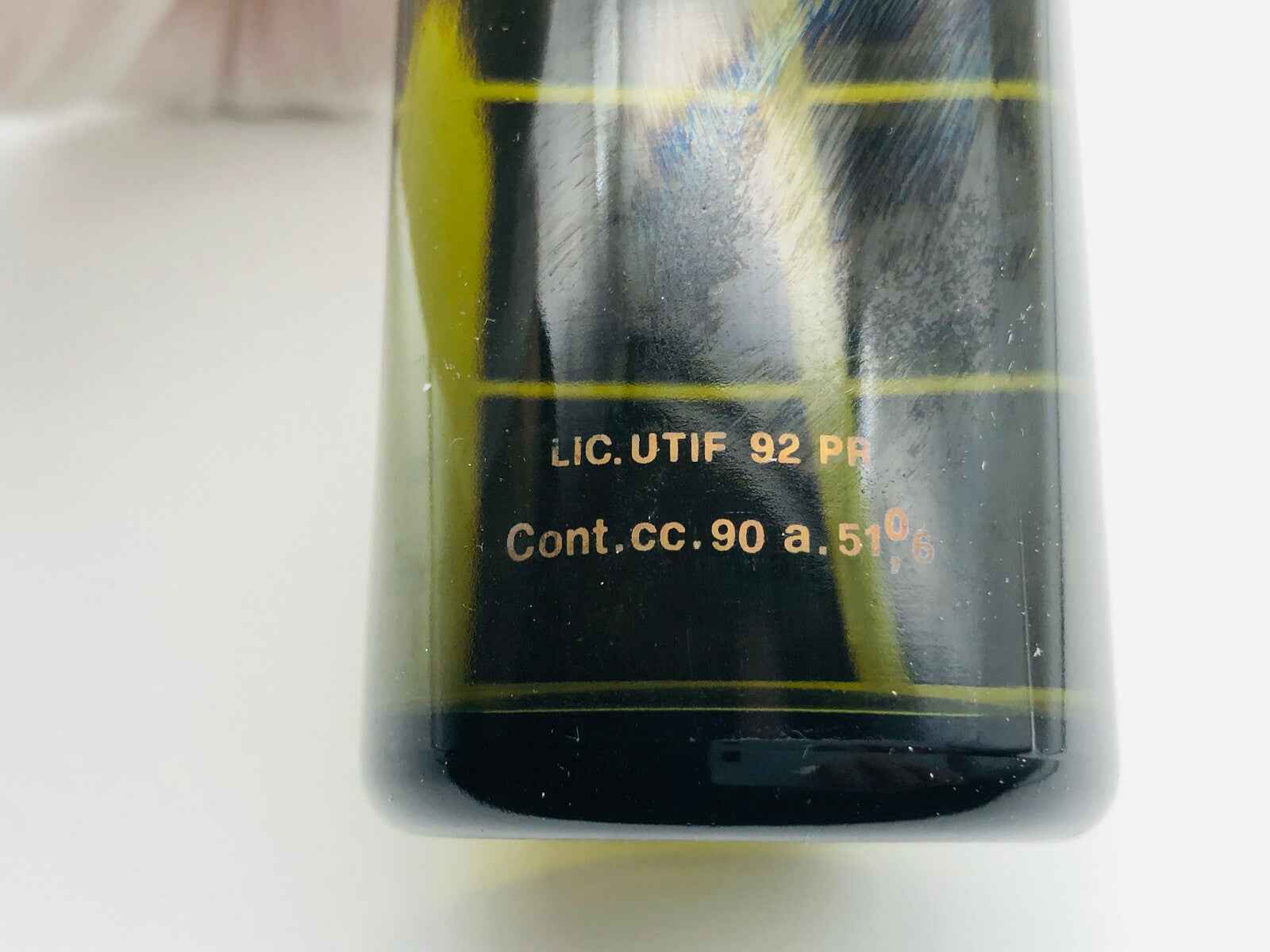 Dettaglio della bottiglia di ADAM EAU DE BRUYERE VINTAGE profumo con etichetta e contenuto