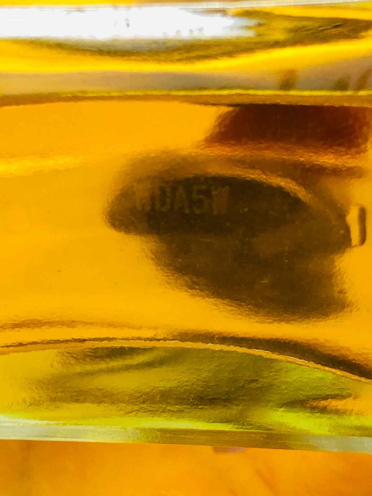 Flacone di Vintage Aramis Cologne con fragranza intensa e design elegante in vetro trasparente