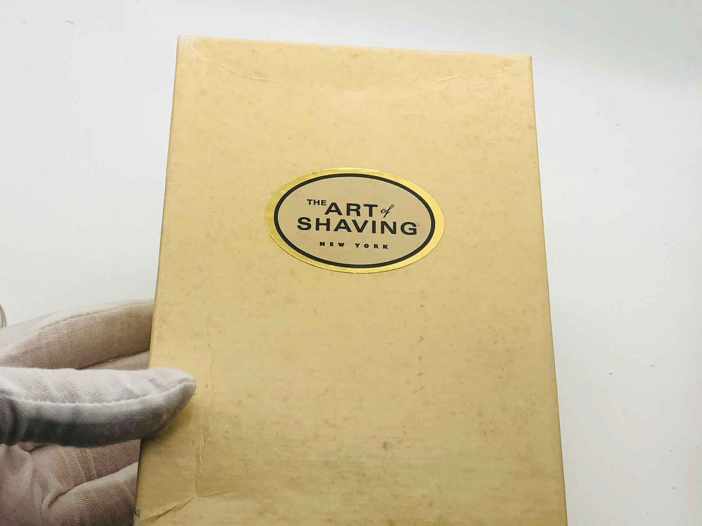 Scatola del supporto compatto Art Of Shaving con design elegante e marchio distintivo