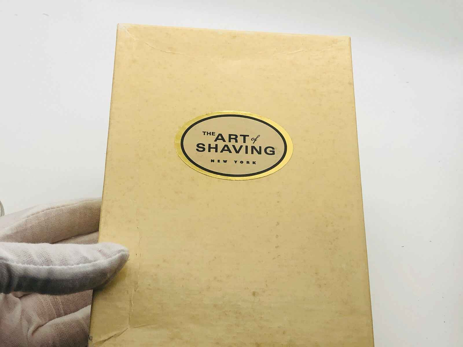 Scatola del supporto compatto Art Of Shaving con design elegante e marchio distintivo