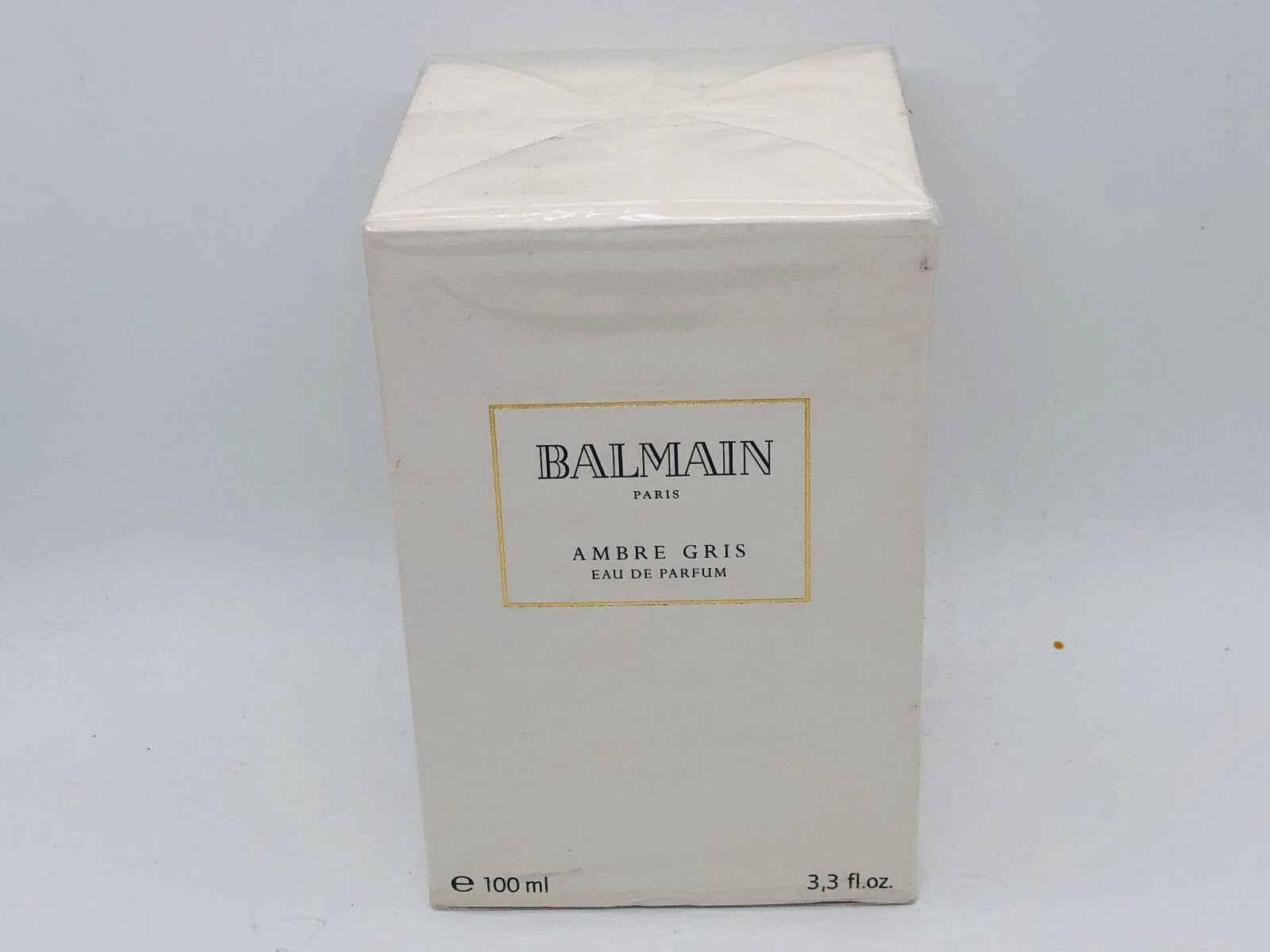 Scatola di profumo Balmain Ambre Gris Vintage da 100 ml in elegante packaging bianco