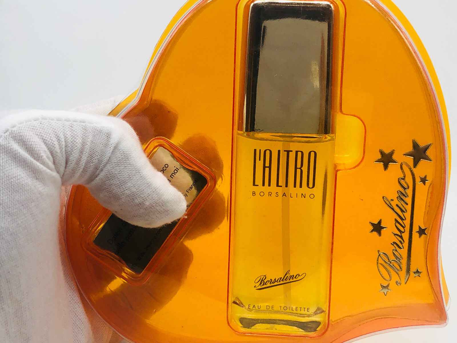 Profumo Borsalino Vintage in flacone giallo con design elegante e scatola decorativa