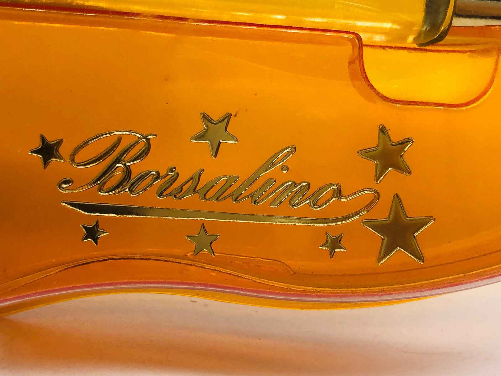 Flacone di profumo Borsalino Vintage con dettagli dorati e stelle sul design elegante