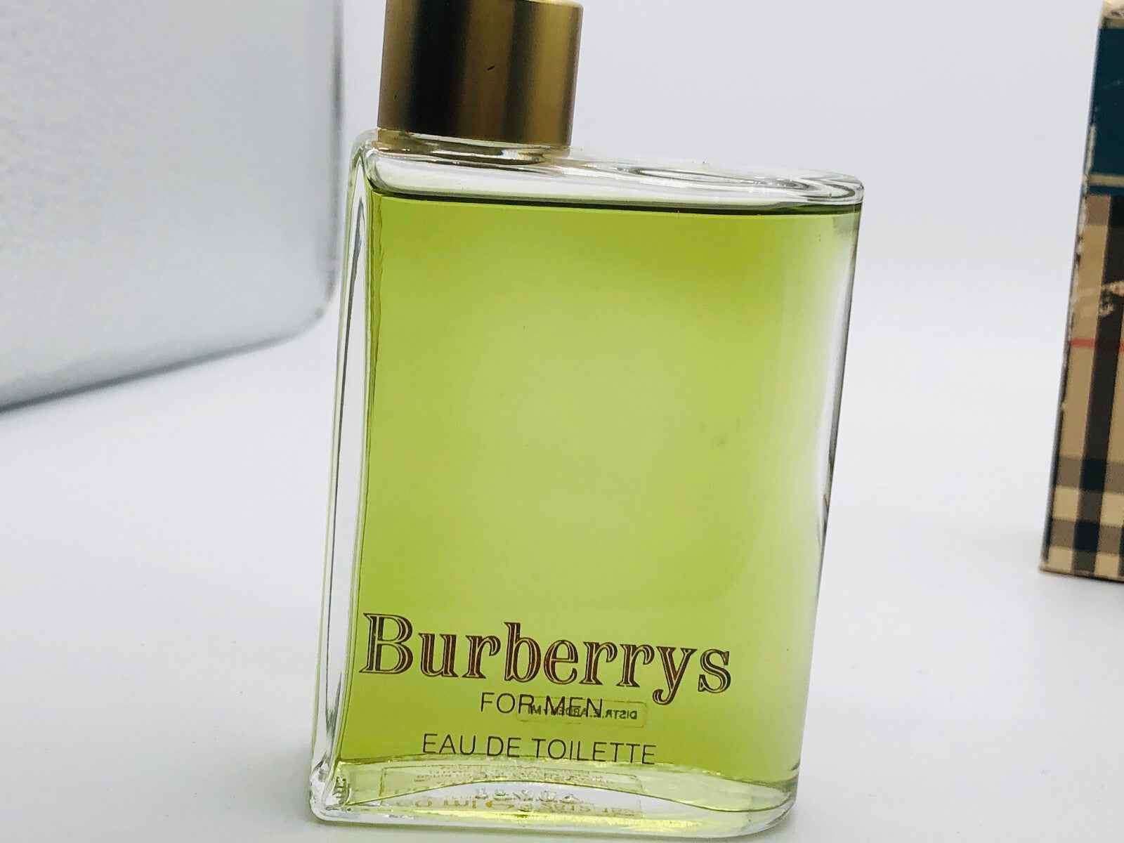Profumo Burberrys For Men Vintage in bottiglia trasparente con etichetta elegante