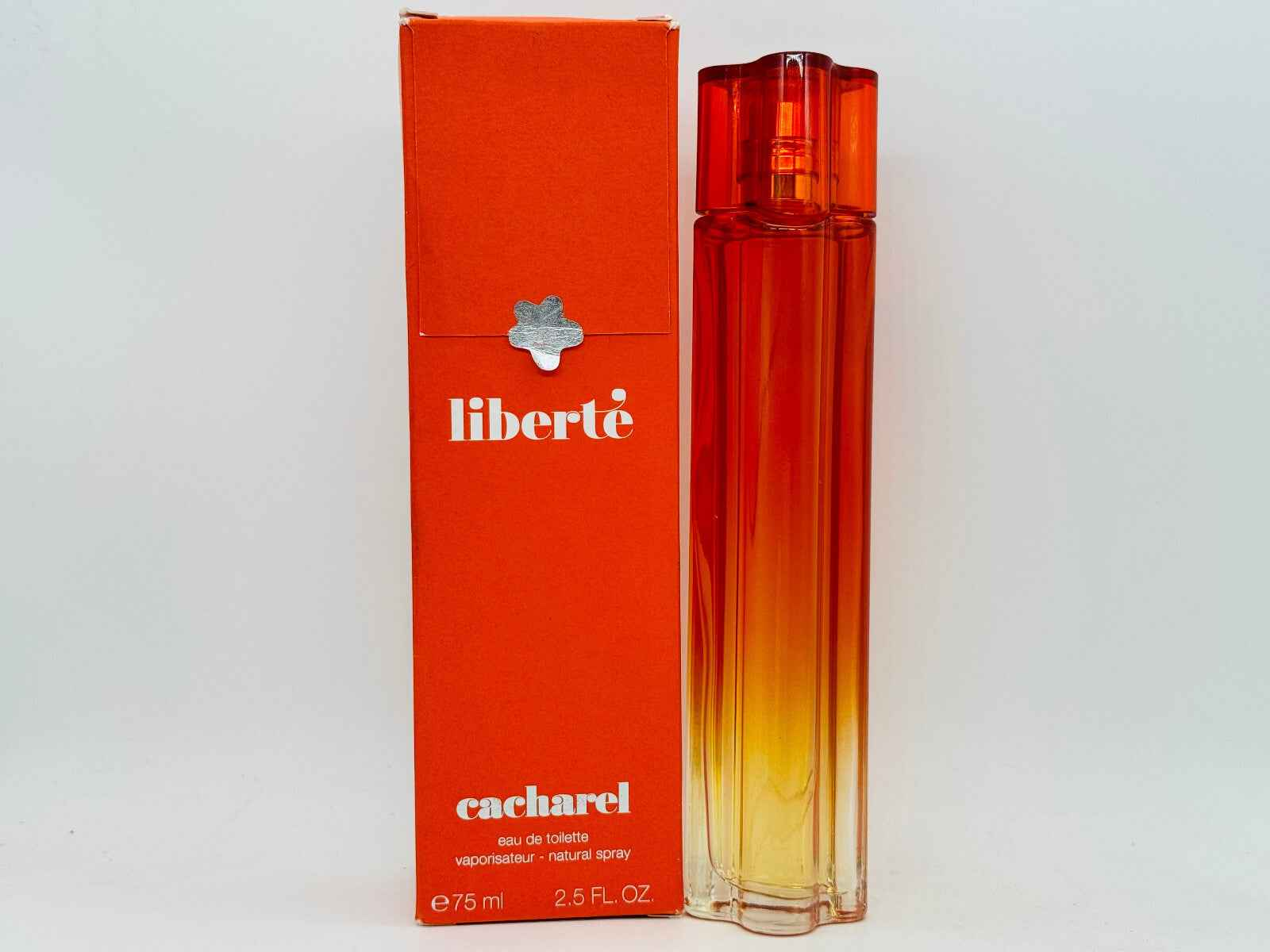 Profumo Cacharel Liberte Vintage in flacone arancione con confezione coordinata da 75 ml
