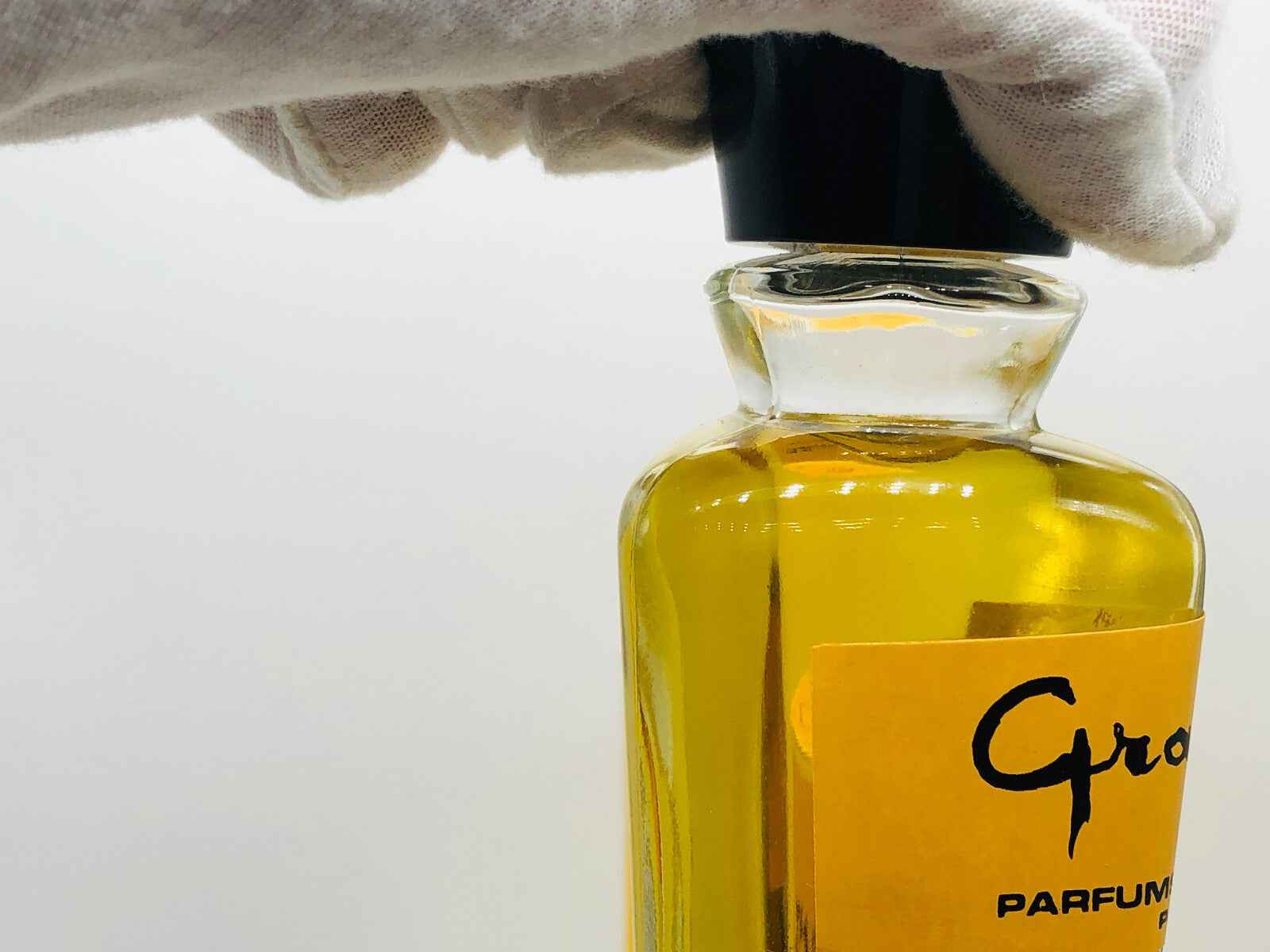 Flacone di profumo Capucci Graffiti Vintage con etichetta gialla e tappo nero