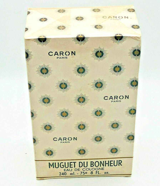 Scatola di Caron Muguet Du Bonheur Eau de Cologne da 240 ml con motivi floreali eleganti