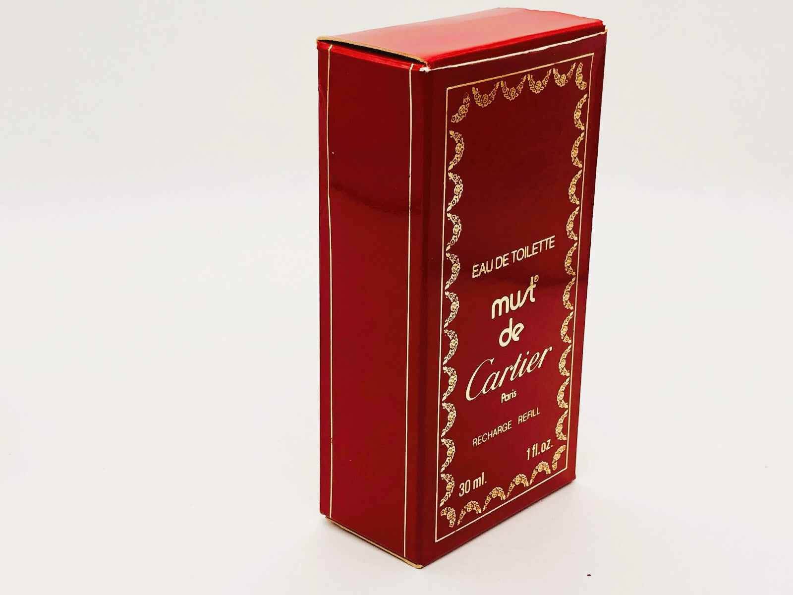 Scatola rossa vintage di profumo Must De Cartier con flacone da 30 ml di eau de toilette