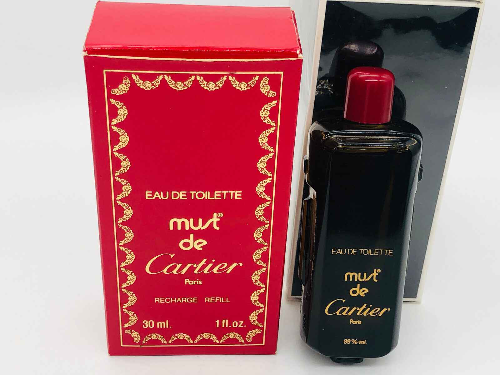 Profumo Must De Cartier Vintage in bottiglia nera con confezione rossa, 30 ml di eau de toilette