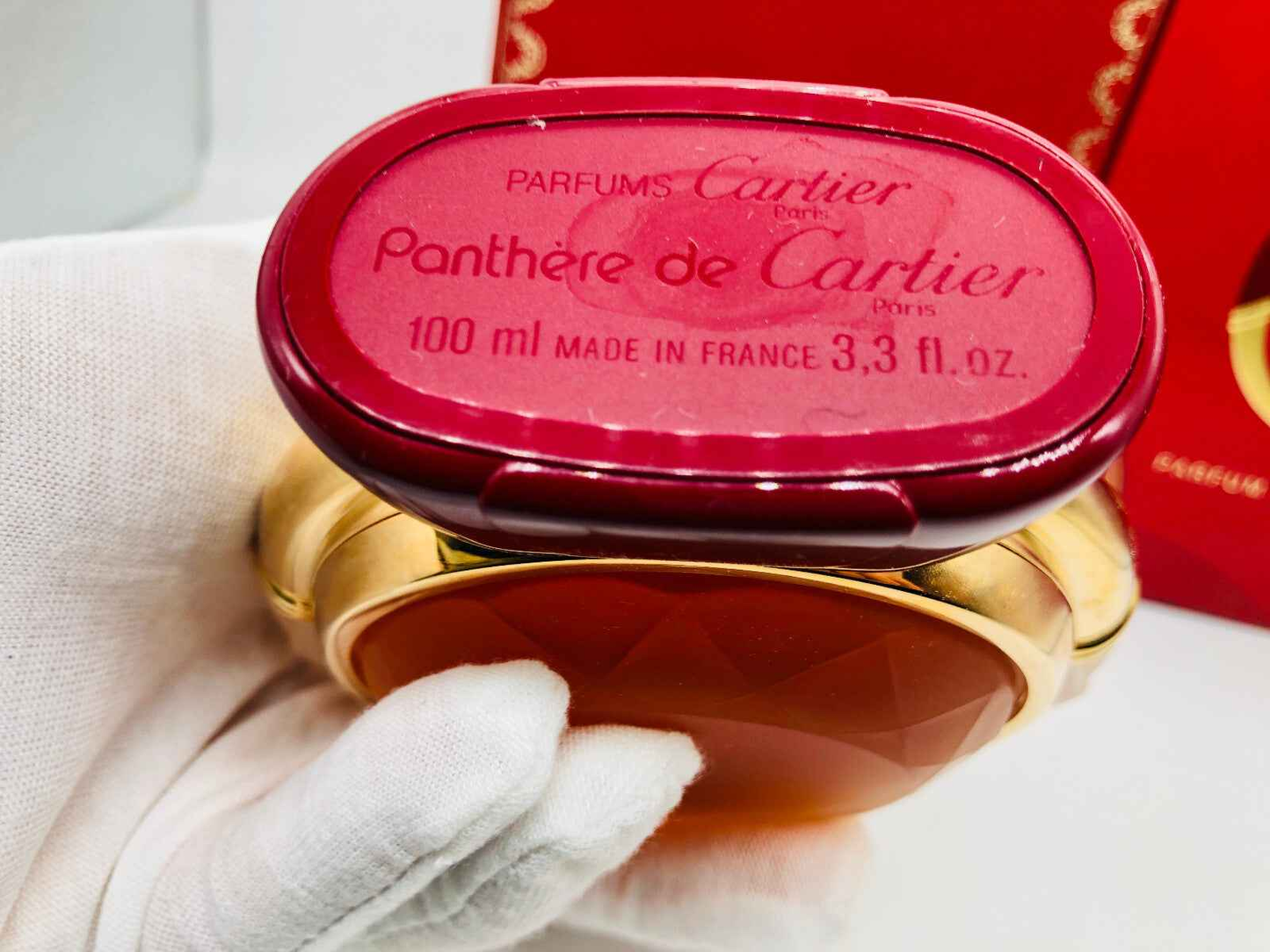 Flacone di profumo Panthere Cartier Vintage da 100 ml con etichetta rossa e confezione elegante
