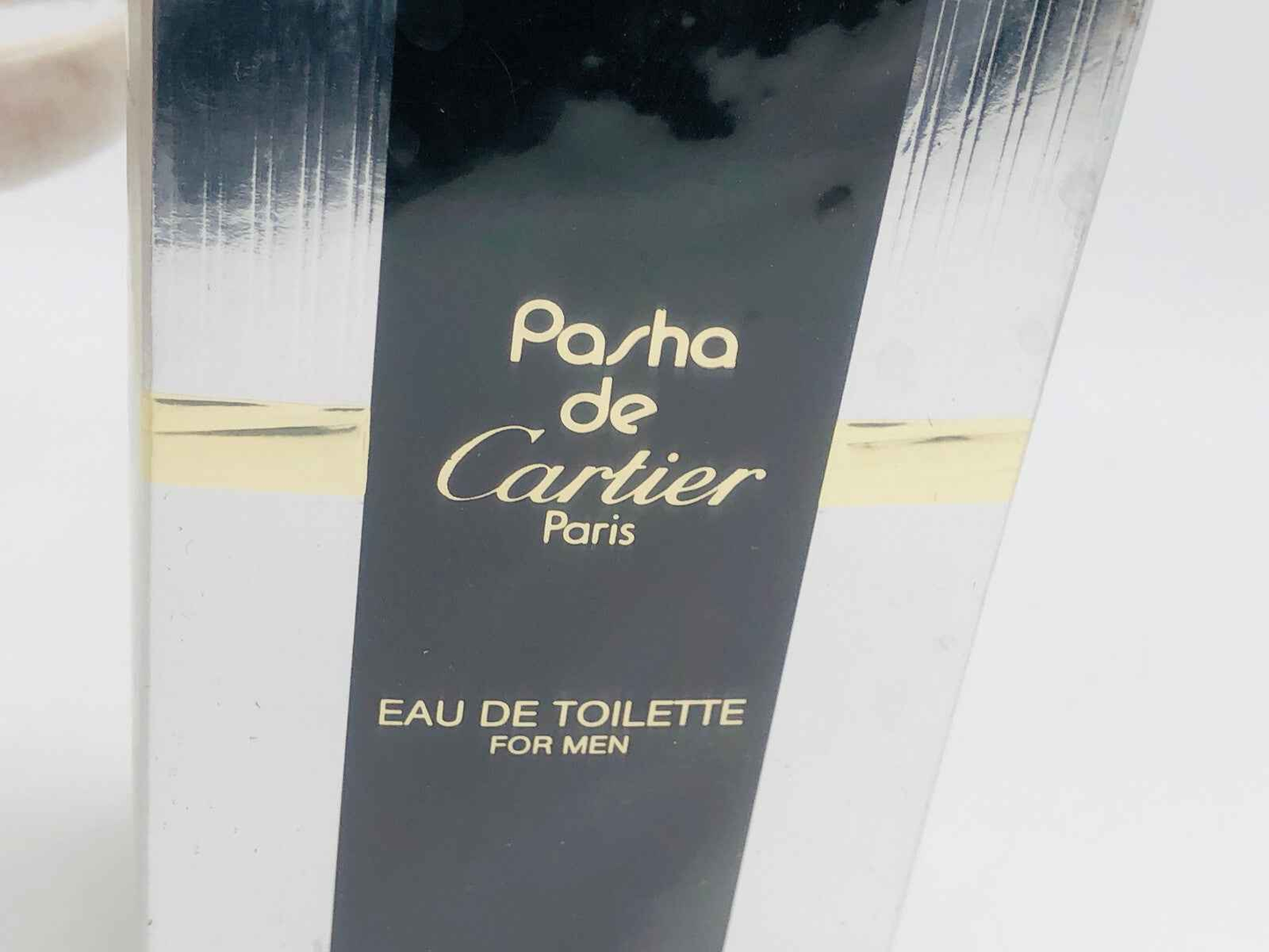 Scatola di profumo Pasha Cartier Vintage con design elegante e dettagli dorati per uomini
