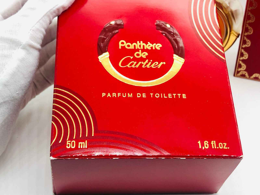 Scatola di profumo vintage Panthere Cartier da 50 ml con design elegante in rosso e dettagli dorati