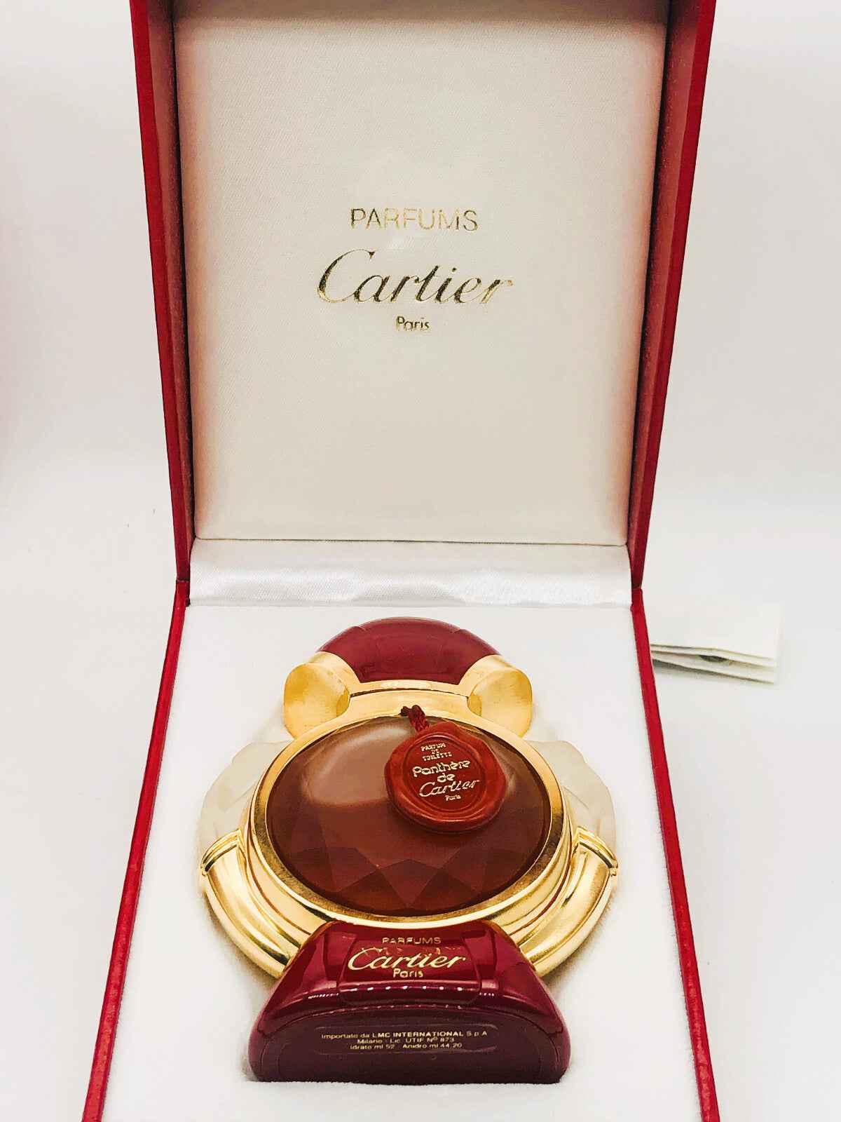 Profumo Vintage Panthere Cartier in elegante confezione rossa con dettagli dorati