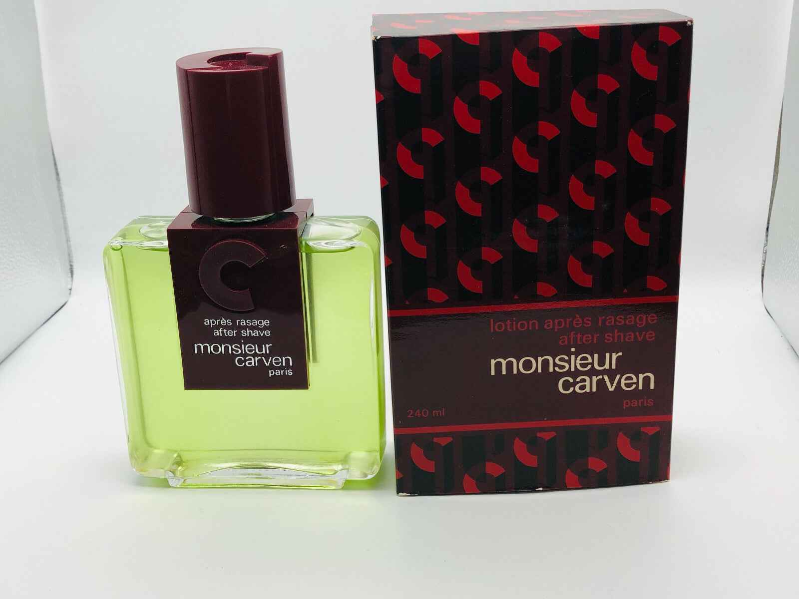 Profumo Carven Monsieur Vintage con flacone verde e confezione rossa, 240 ml di dopobarba