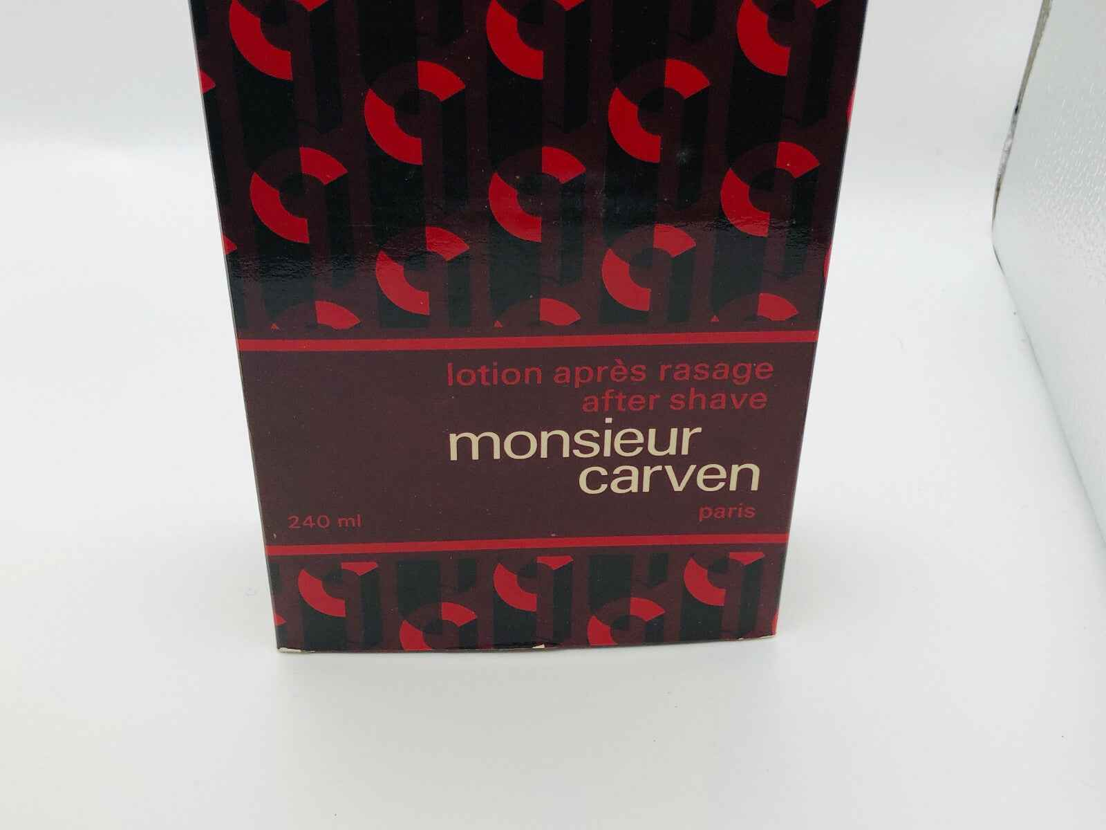 Flacone di lozione dopobarba Carven Monsieur Vintage da 240 ml con design elegante e colori sofisticati