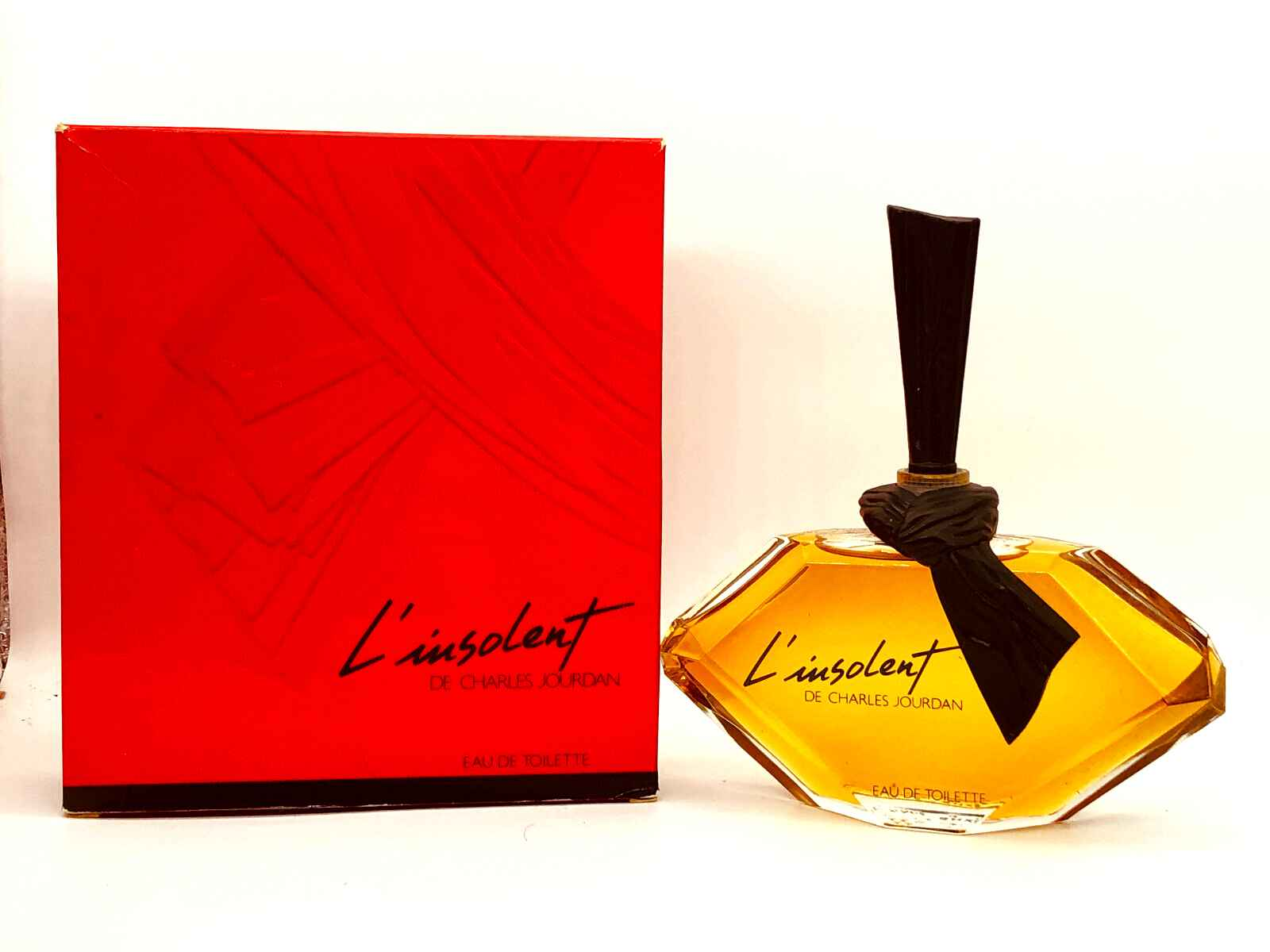 Profumo L'Insolent Charles Jourdan in flacone elegante con scatola rossa