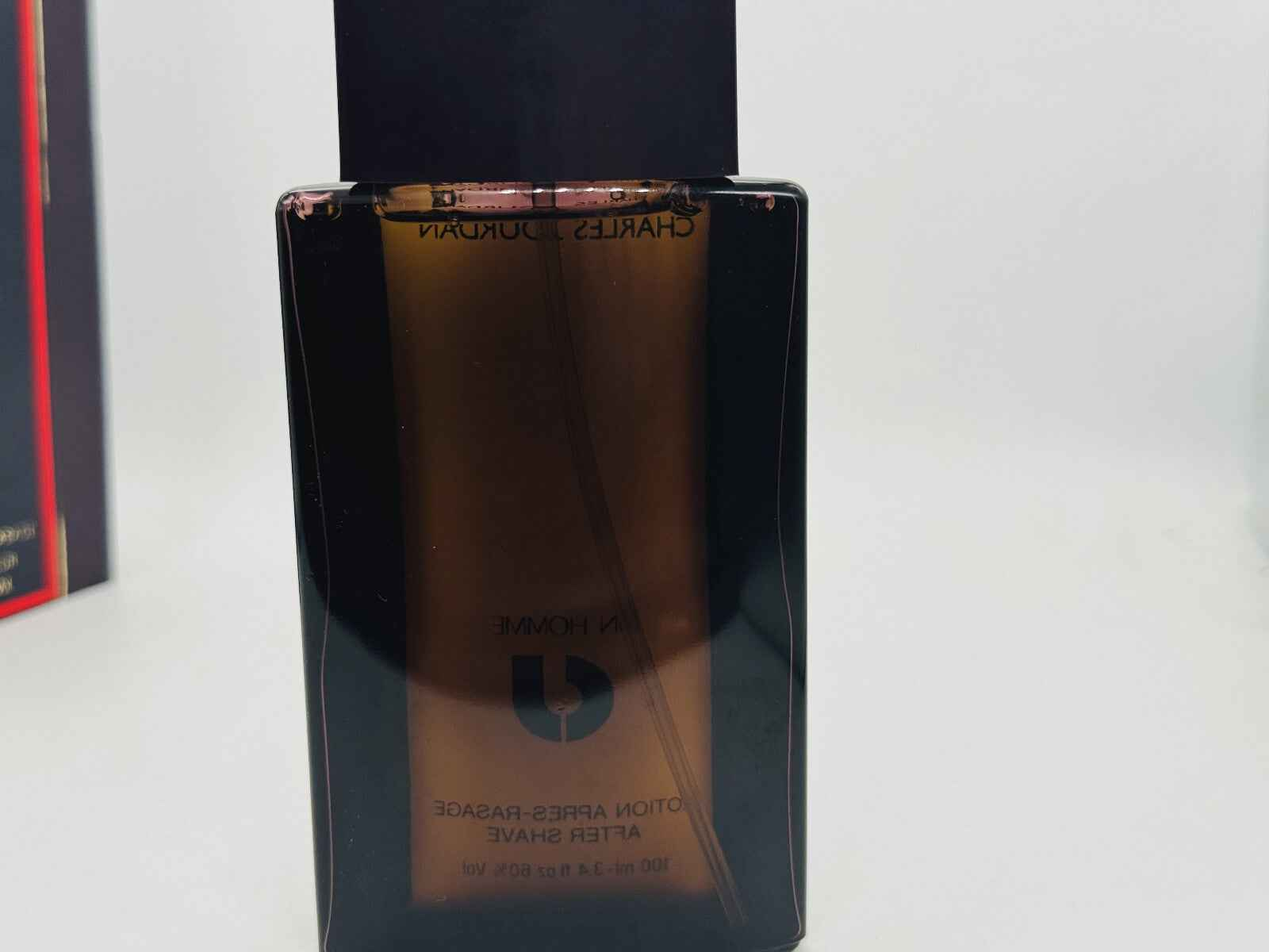 Profumo Charles Jourdan Un Homme Vintage in bottiglia elegante con design moderno e sofisticato