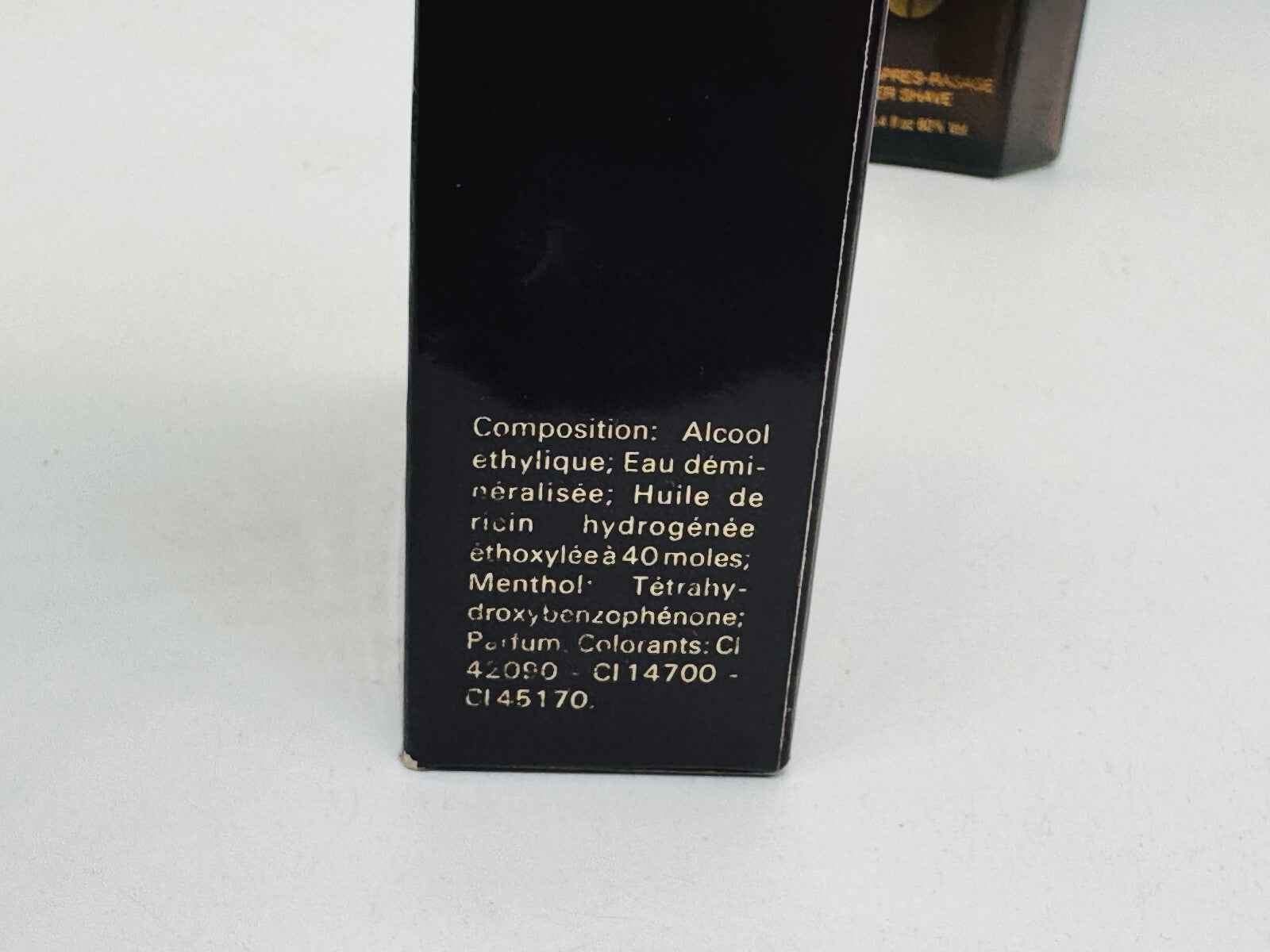 Flacone di Charles Jourdan Un Homme Vintage con etichetta dettagliata sulla composizione del profumo