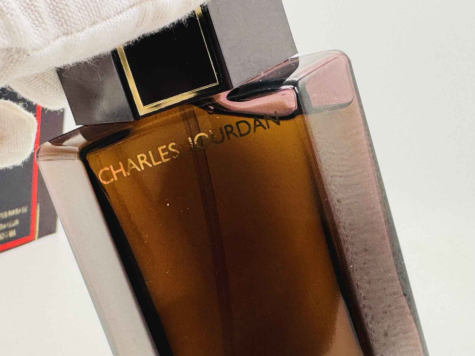 Profumo CHARLES JOURDAN Un Homme Vintage in bottiglia marrone elegante per uomini raffinati