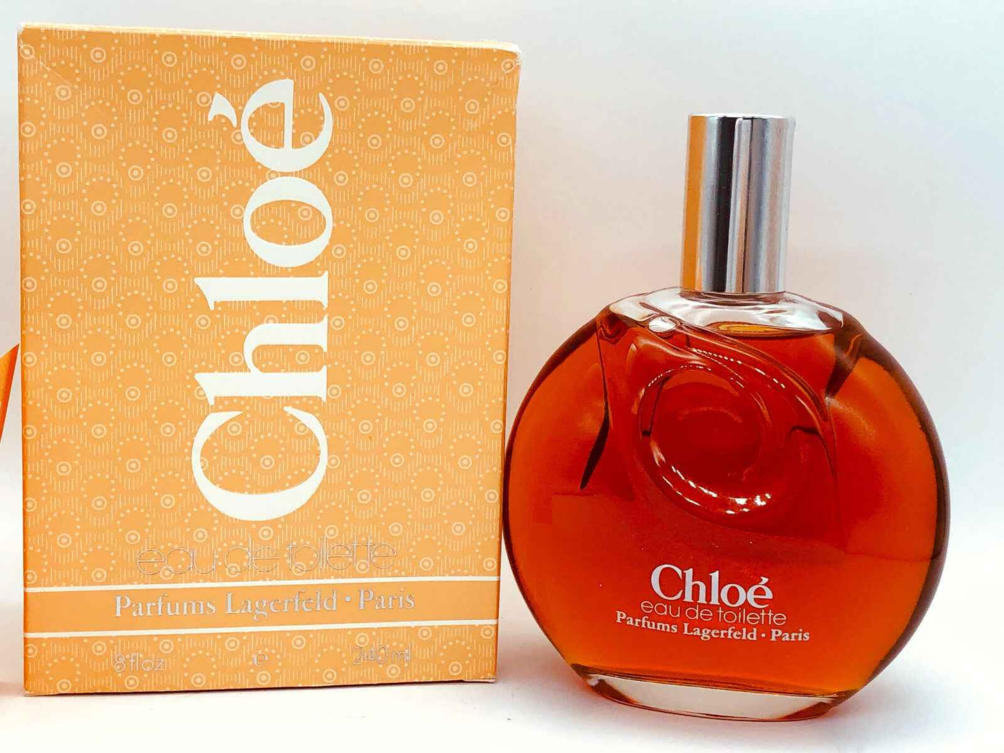 Profumo Chloe Karl Lagerfeld Vintage Eau de Toilette in flacone rotondo con confezione arancione