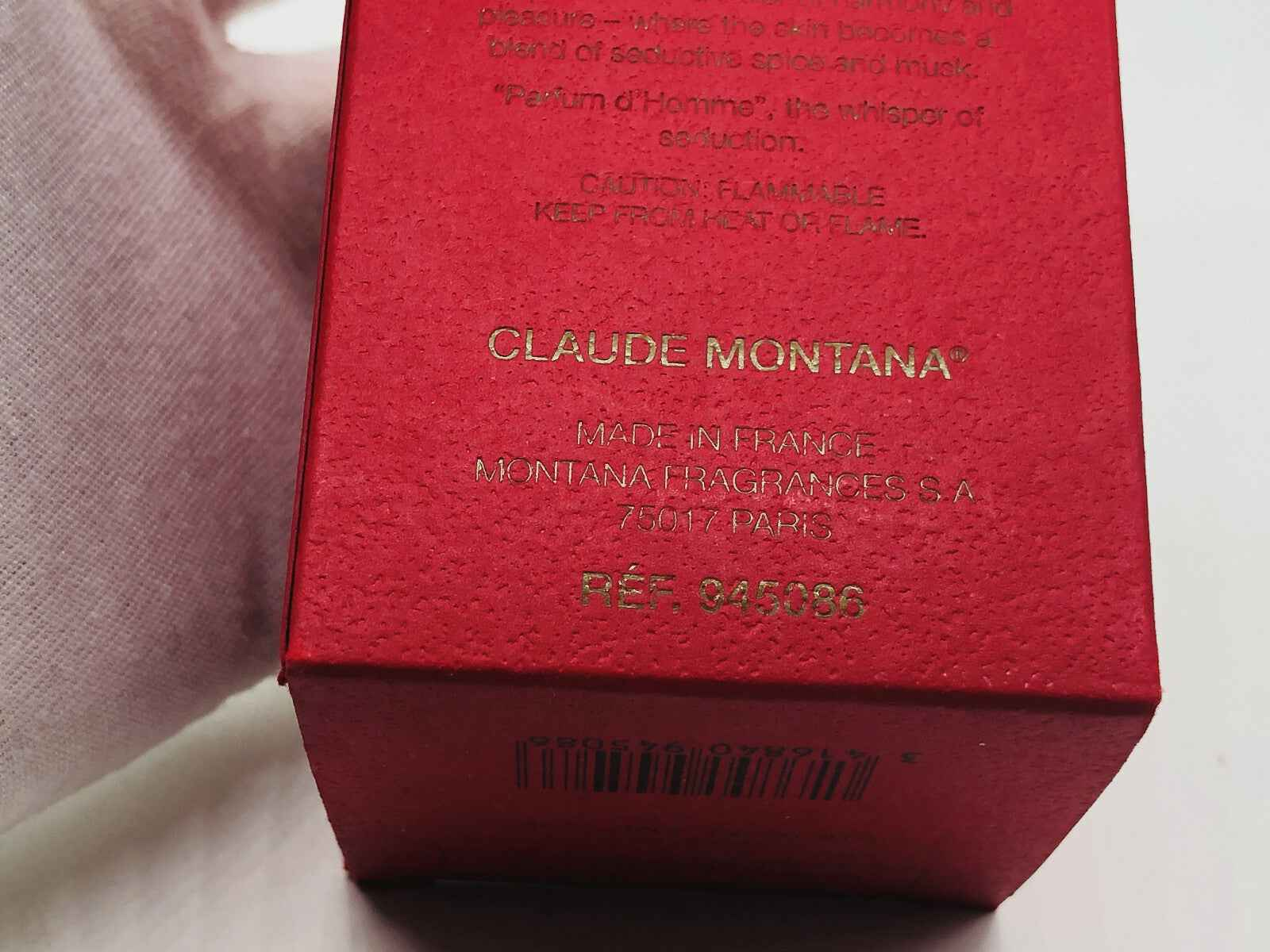 Confezione rossa di Claude Montana Parfum Homme con dettagli dorati, elegante e raffinato