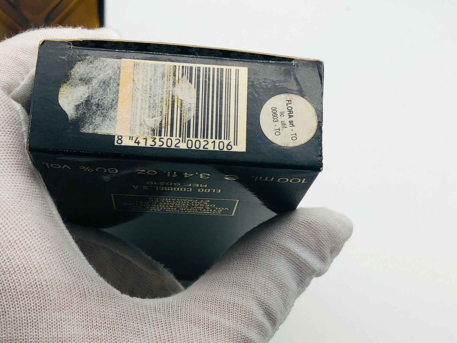 Scatola di profumo Codibel Paris Dakar Vintage con codice a barre su fondo nero