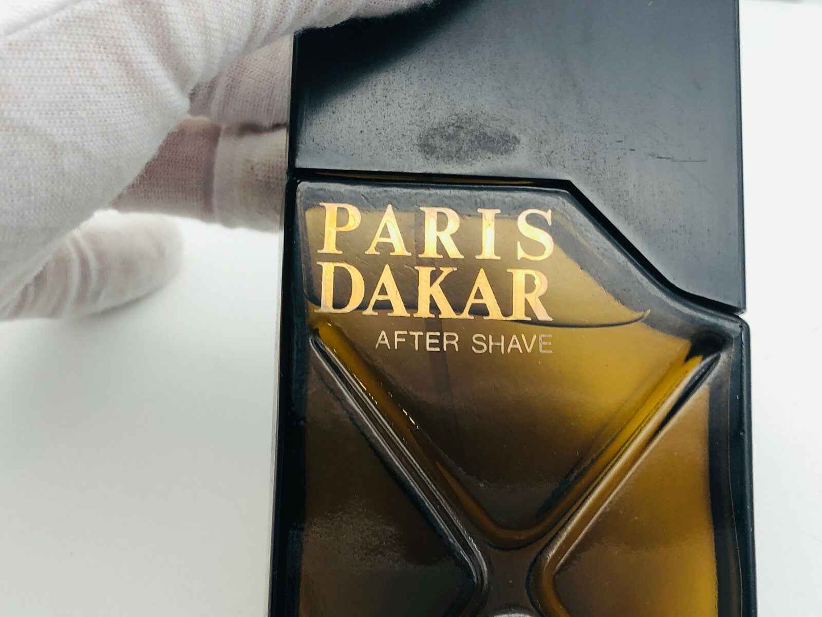 After shave Paris Dakar con design vintage Codibel Paris Dakar in elegante bottiglia nera