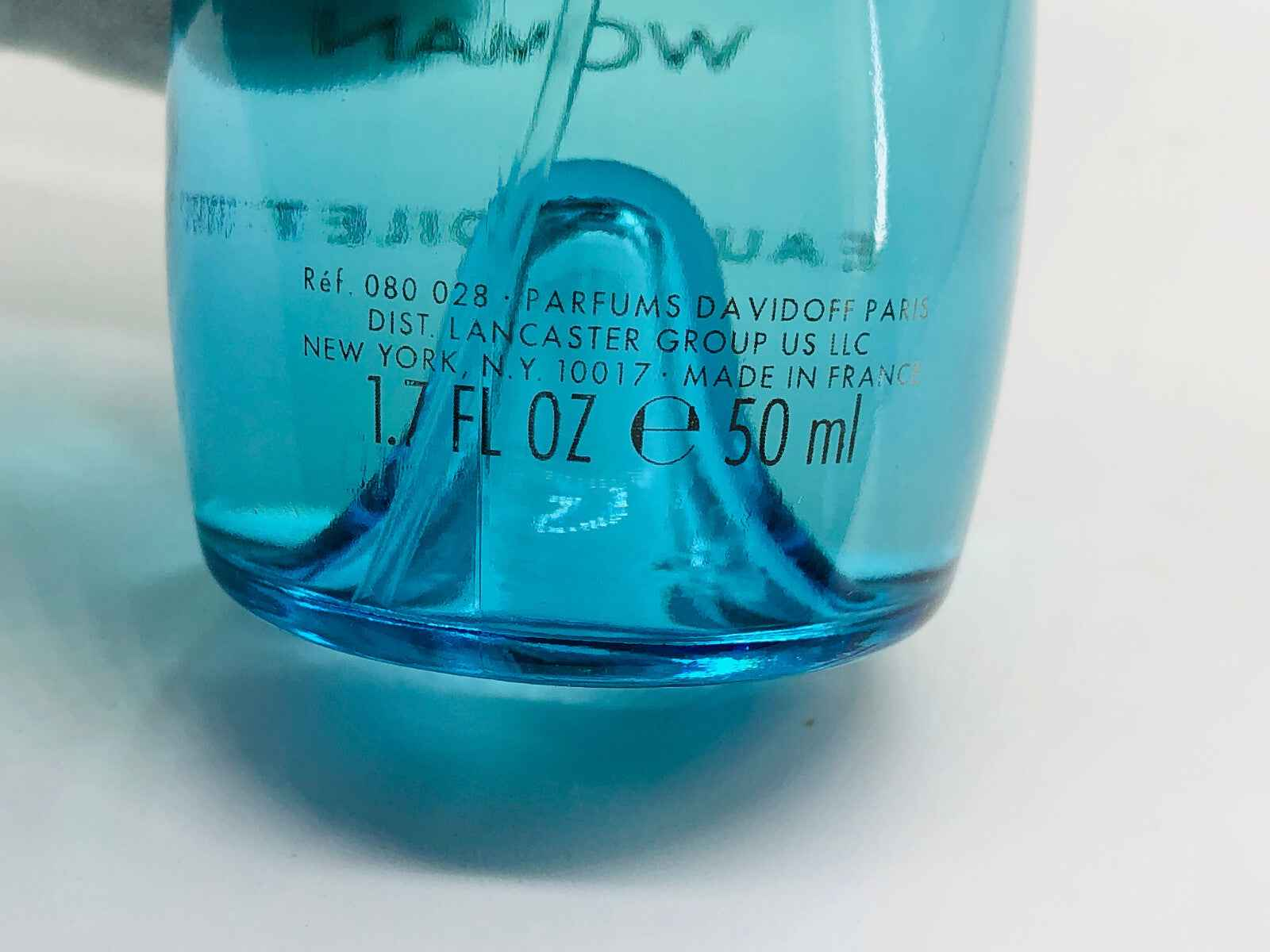 Flacone di profumo Vintage Cool Water Davidoff da 50 ml con design blu e dettaglio elegante
