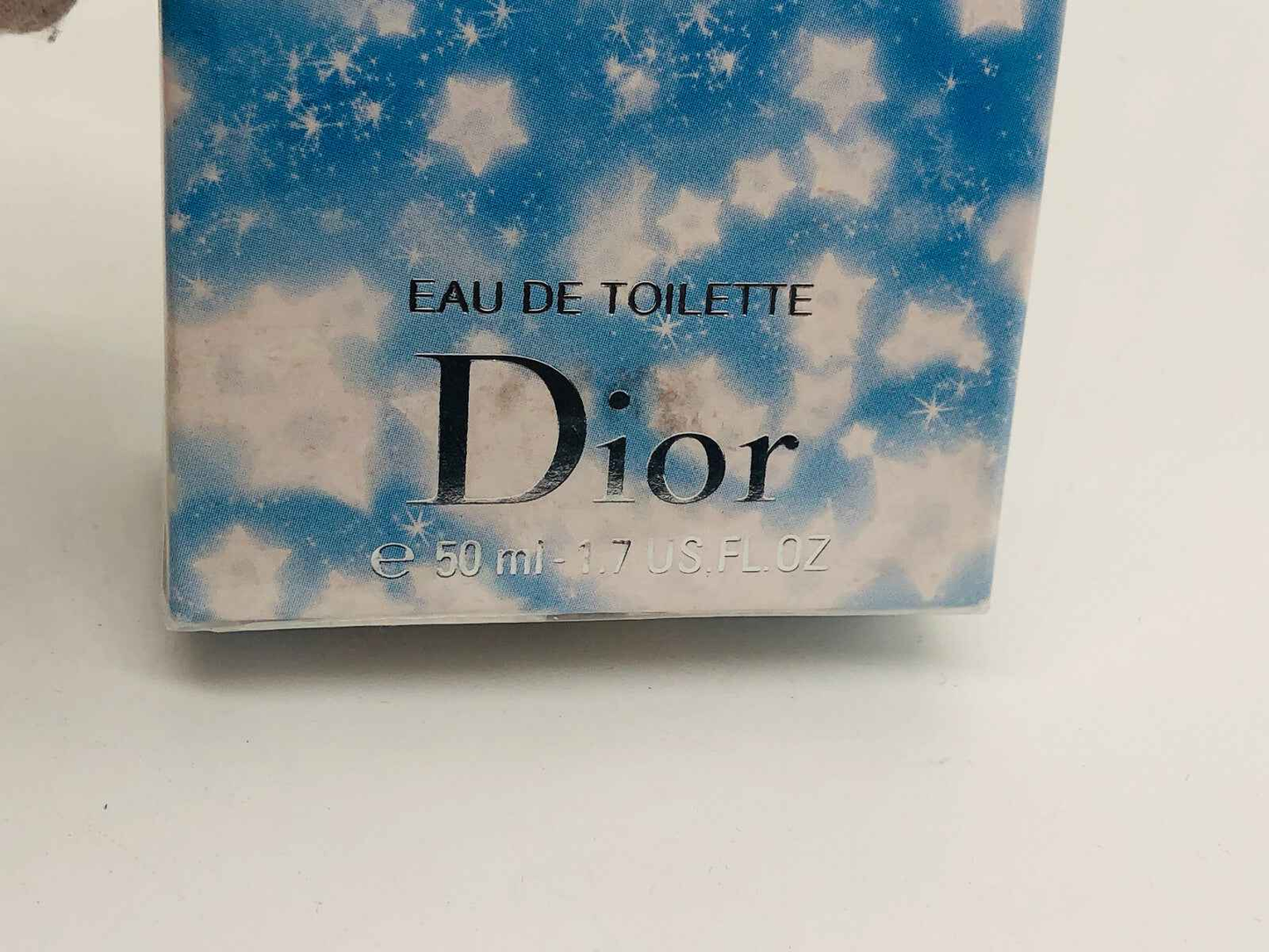 Confezione del profumo Dior Star 50 ml con design blu e stelle luminosi