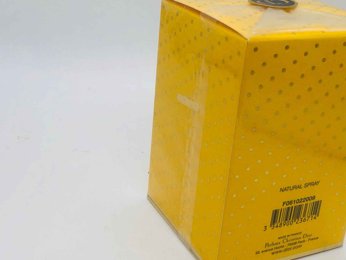 Packaging del profumo Dolce Vita di Dior in scatola gialla con dettagli a pois