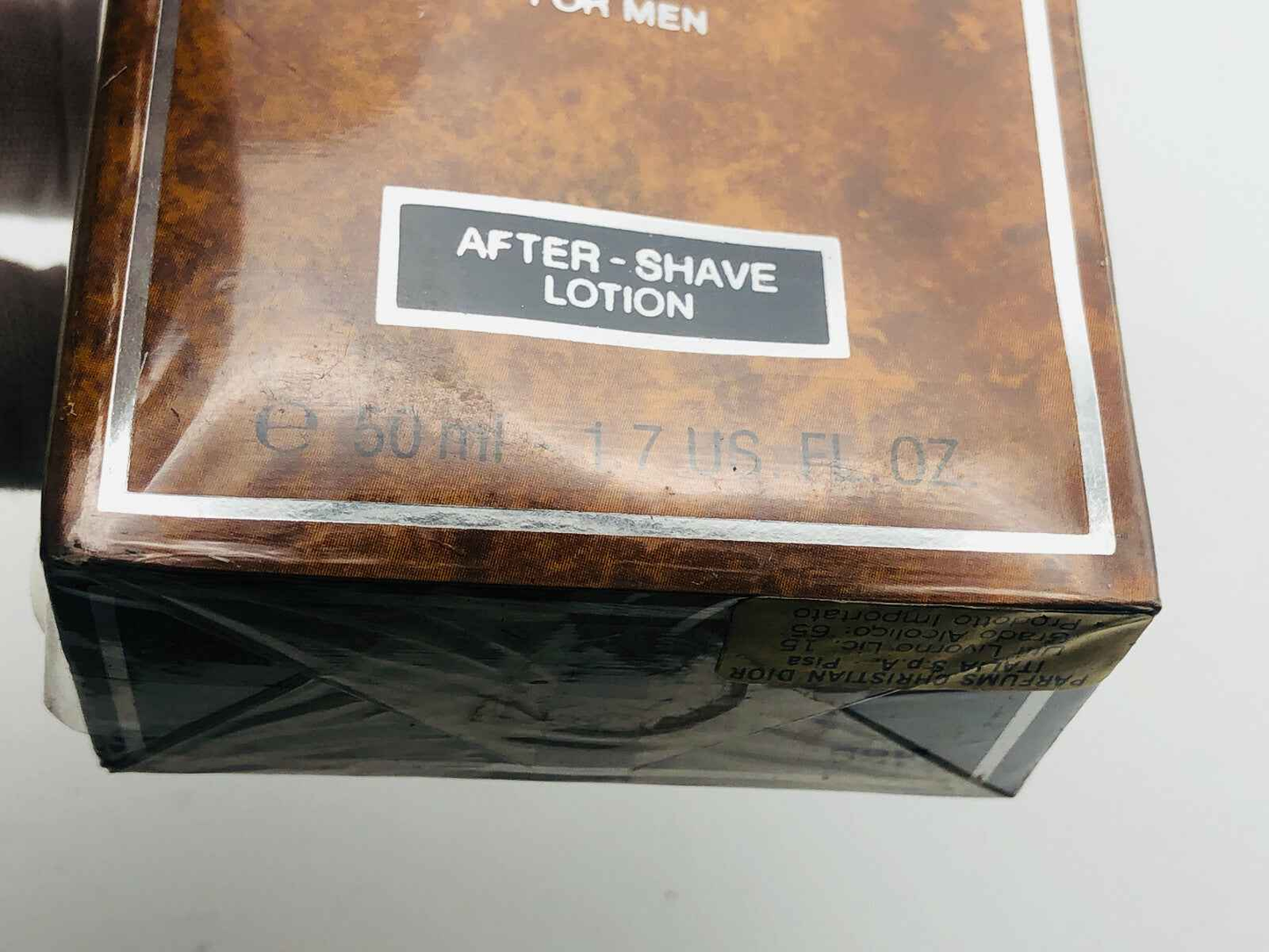 Confezione Dior Sauvage Extreme lozione dopobarba per uomo da 50 ml con design marrone