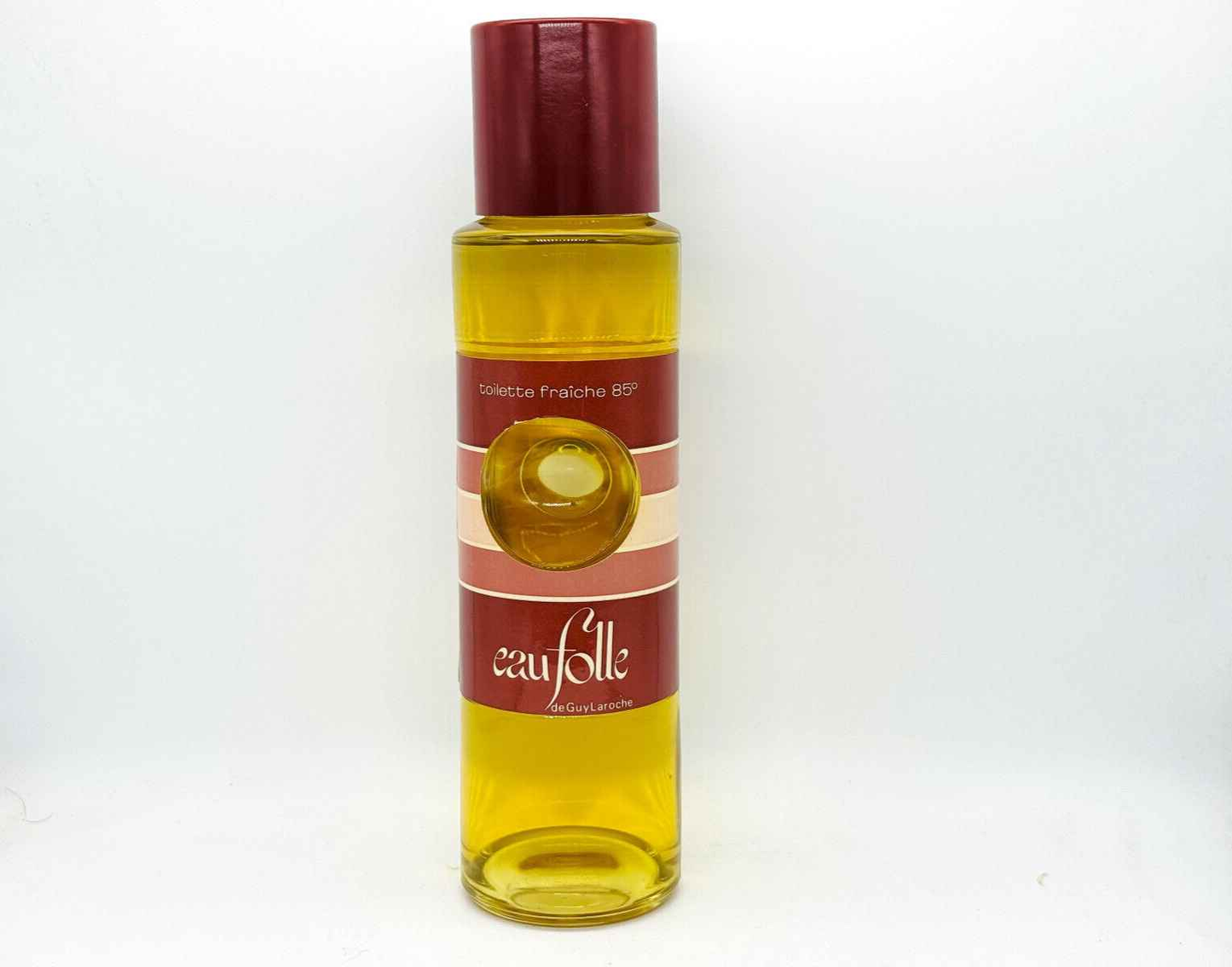 Profumo Eau Folle Laroche Vintage in bottiglia elegante con tonalità giallo e rosso per un aroma fresco