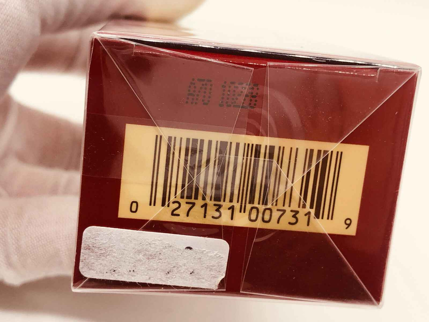Scatola di profumo Estée Lauder Cinnabar Vintage con codice a barre sul retro