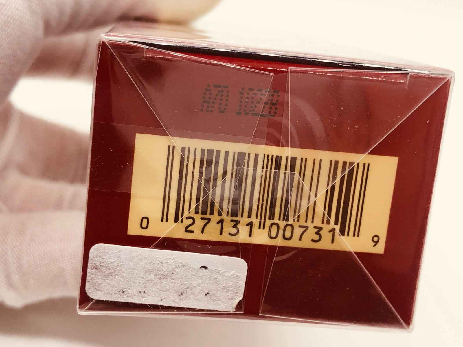 Scatola di profumo Estée Lauder Cinnabar Vintage con codice a barre sul retro
