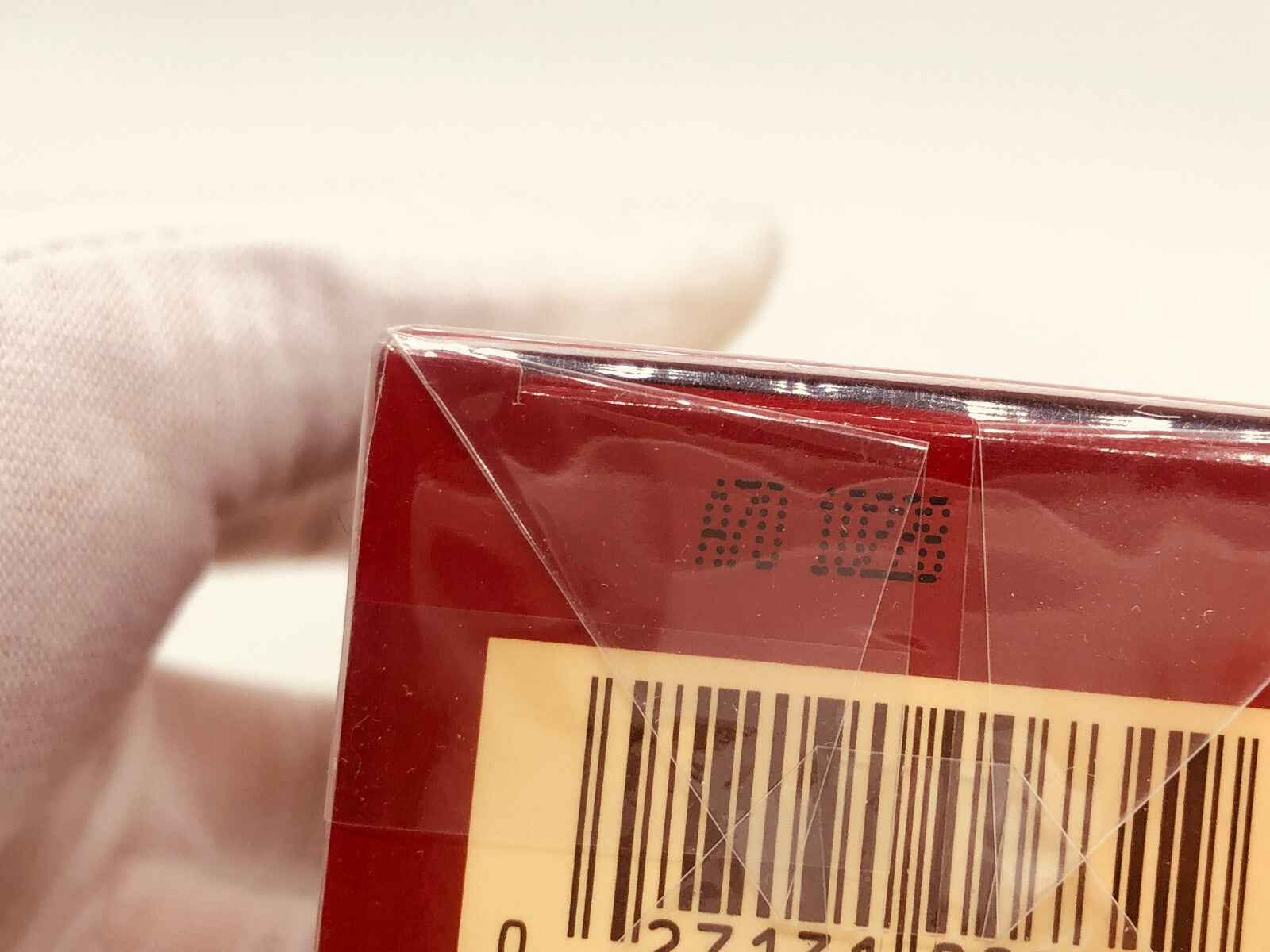 Scatola di Estee Lauder Cinnabar Vintage con codice a barre e dettagli di confezionamento