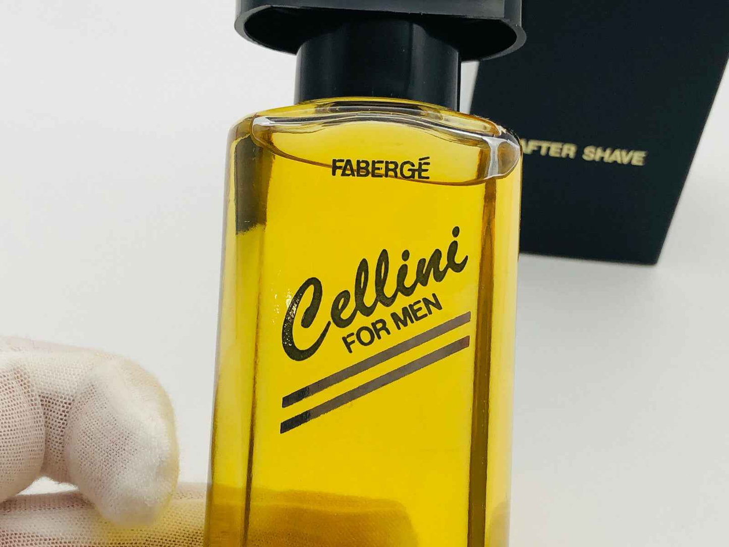 Flacone di dopobarba Faberge Cellini Vintage in vetro giallo con etichetta nera per uomini