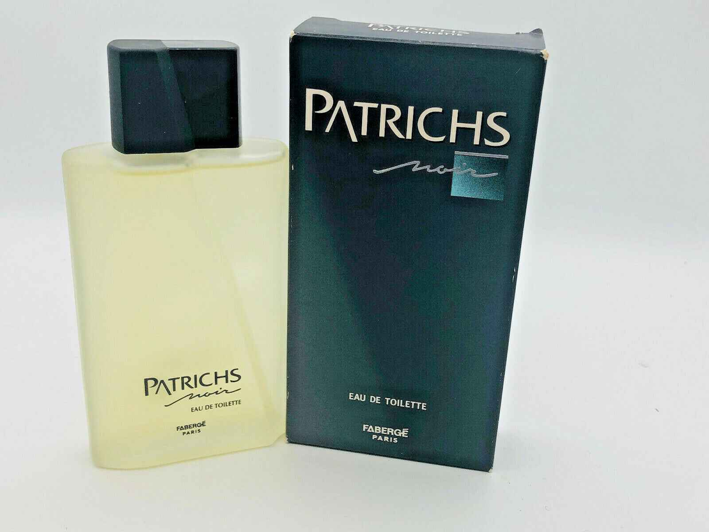 Profumo Patrichs Noir Vintage in bottiglia trasparente con confezione elegante di Fabergé