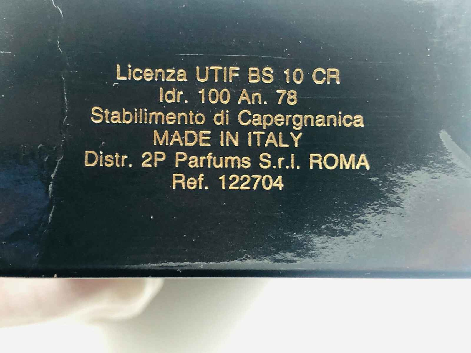 Scatola del profumo Fausto Sarli con dettagli di licenza e produzione Made in Italy