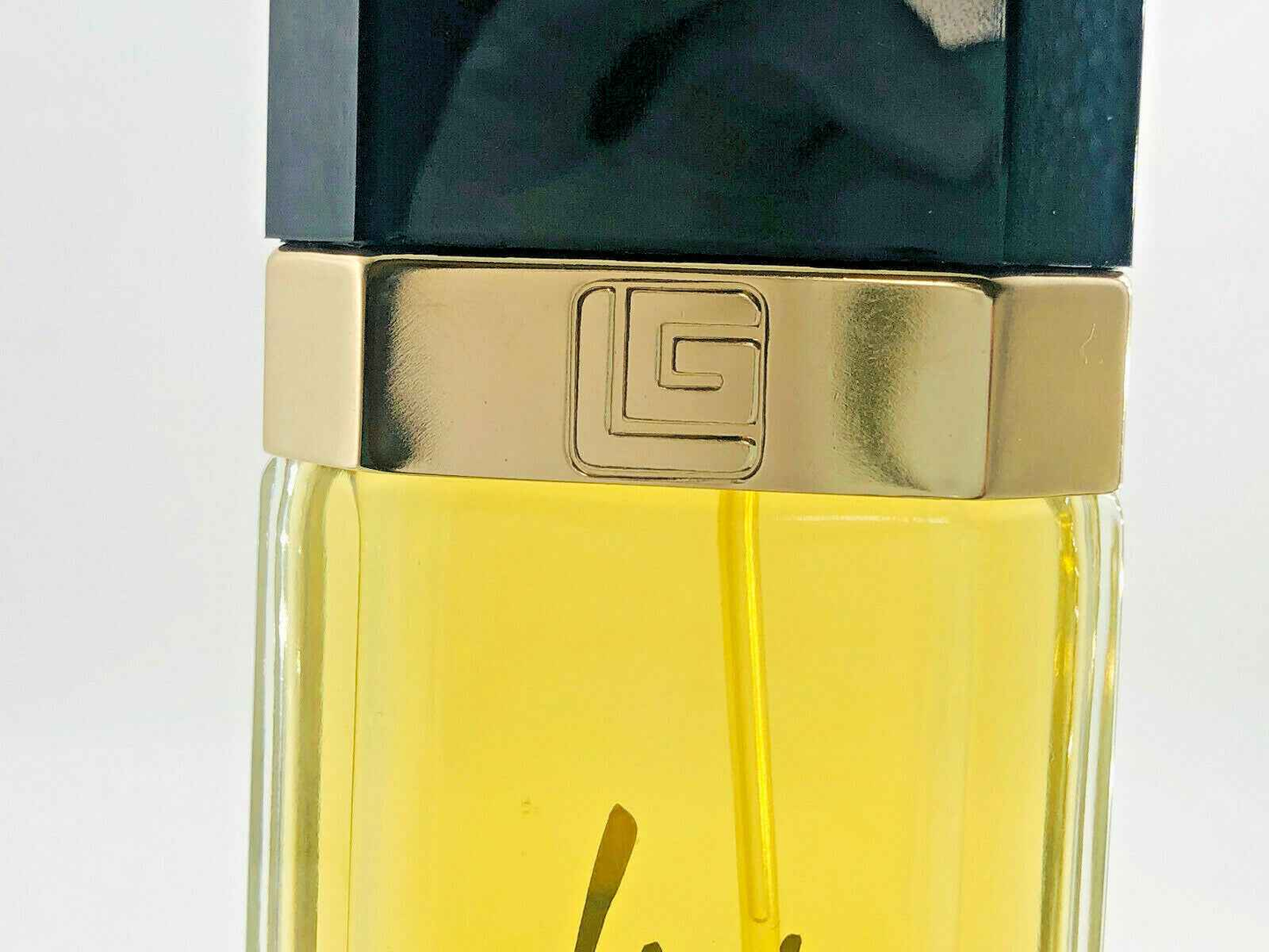 Flacone di profumo Fidji Guy Laroche Vintage con tappo nero e dettagli dorati