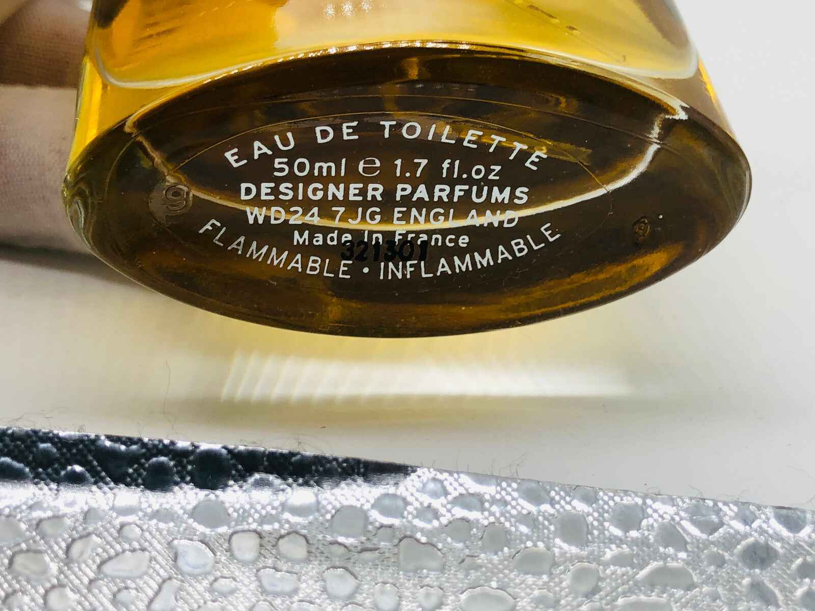 Flacone di profumo Francesco Smalto Vintage da 50 ml con etichetta in francese e design elegante