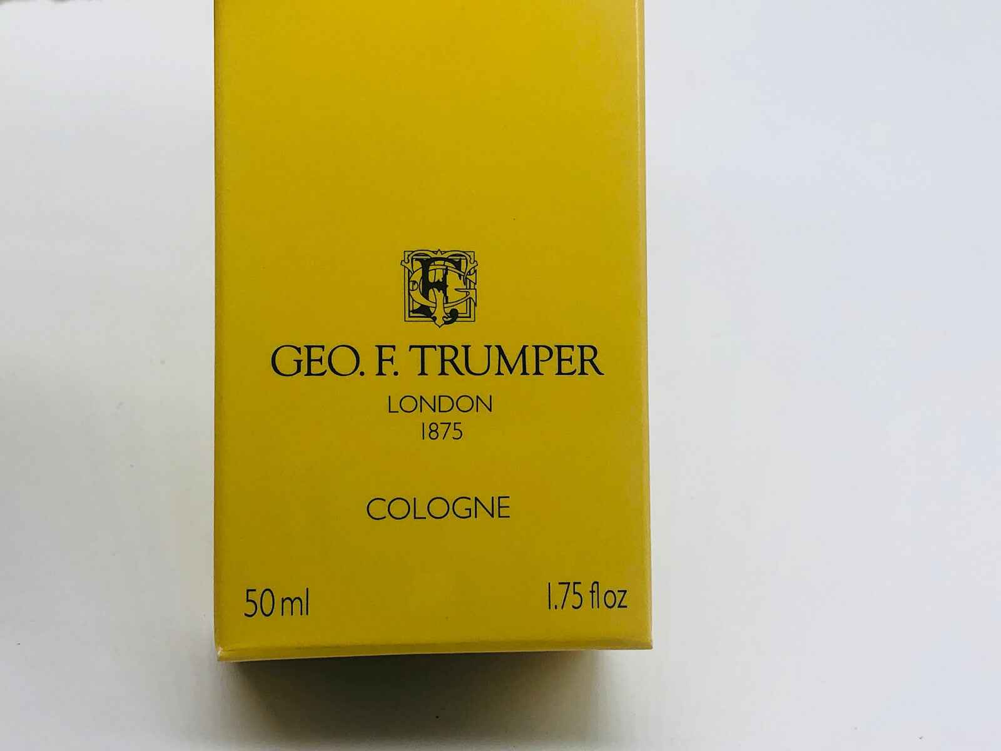 Scatola del profumo Geo F Trumper Gft in giallo da 50 ml con logo e dettagli del prodotto