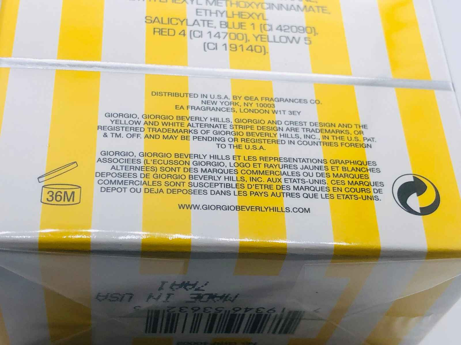 Scatola di profumo Giorgio Beverly Hills Homme con etichette e informazioni sul prodotto.