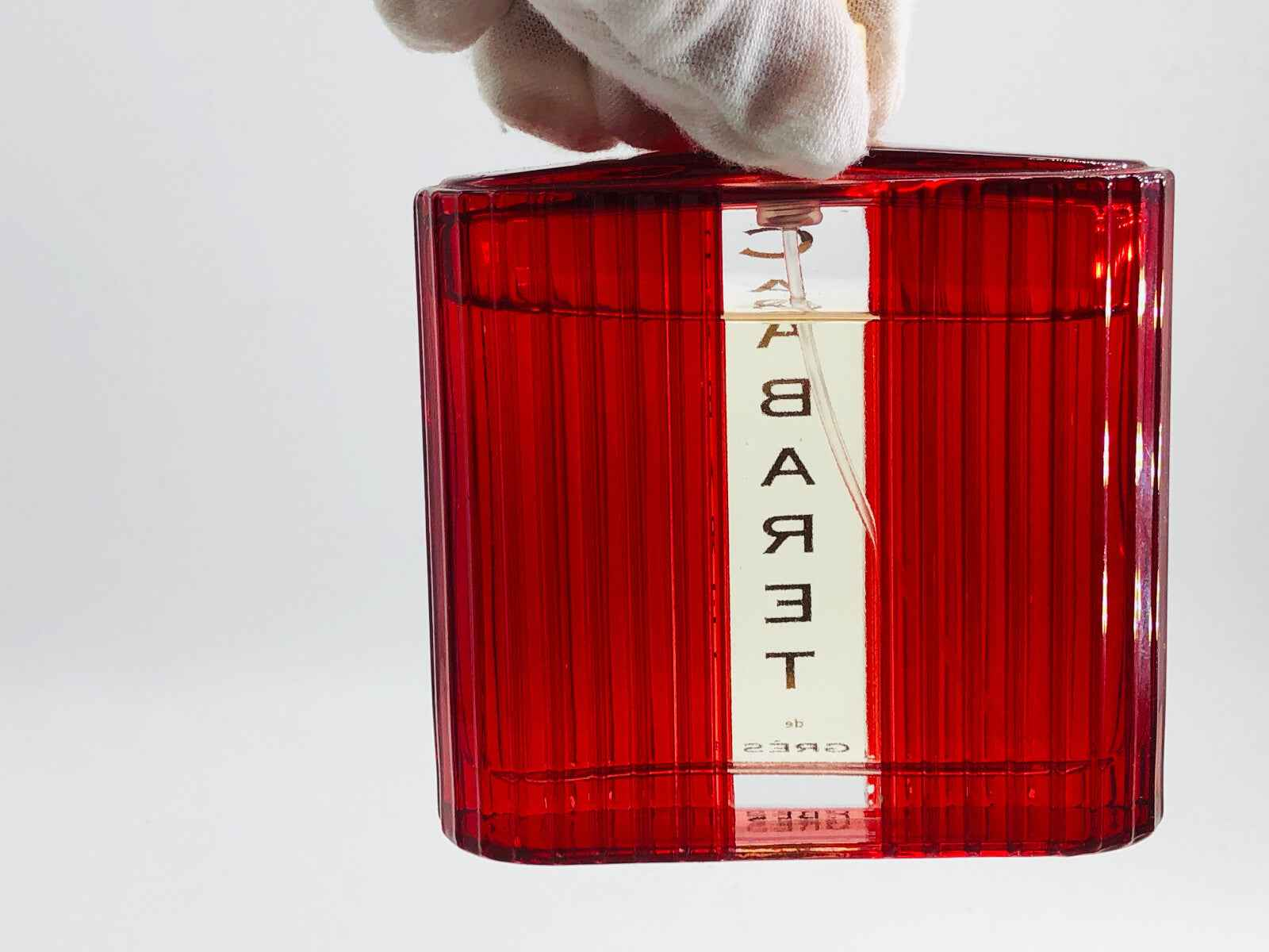 Flacone di Profumo Vintage Gres Cabaret in rosso con una finitura a righe distintive