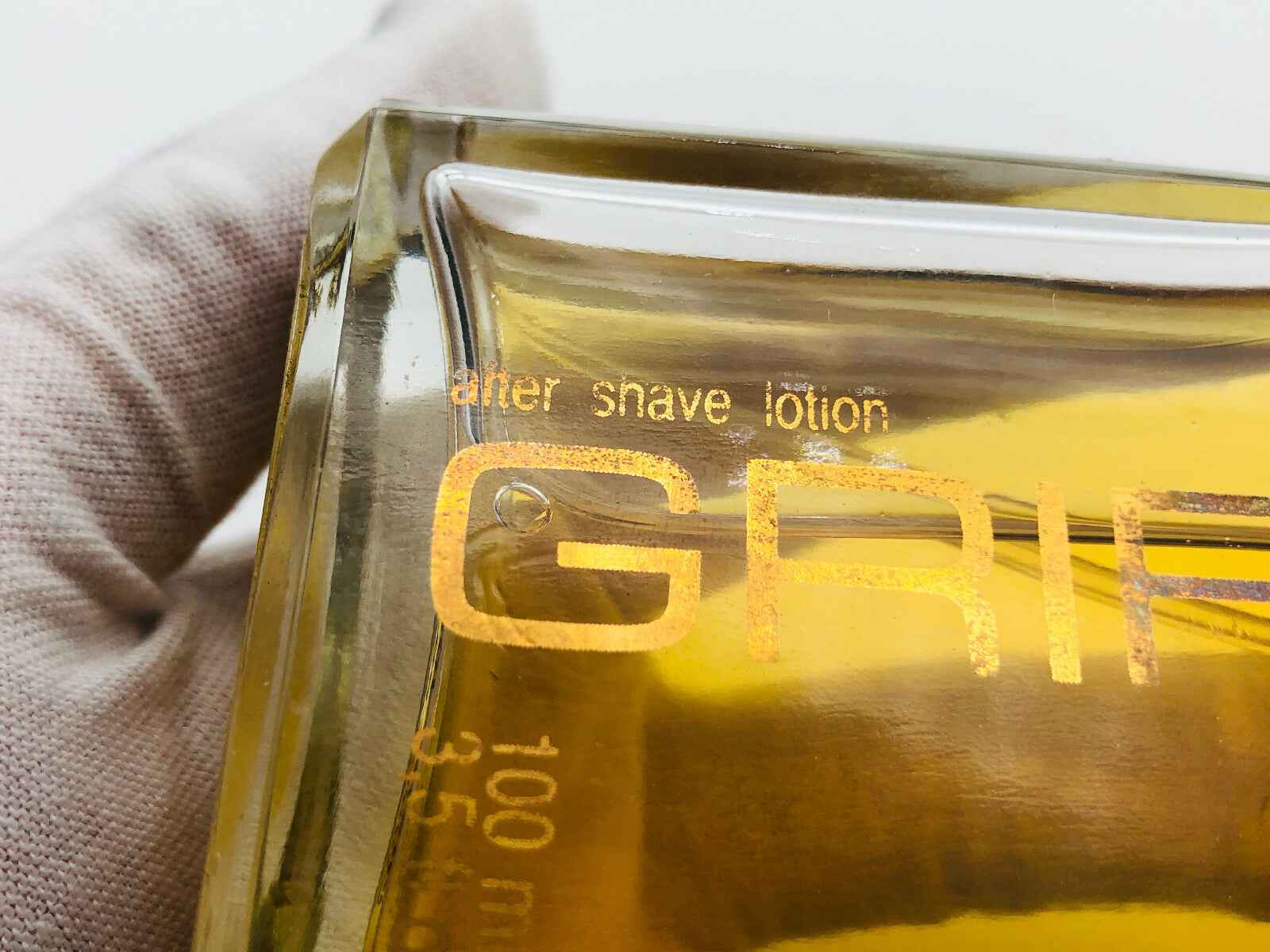 Dopo barba GRIFFI Uomo Vintage in bottiglia trasparente con soluzione dorata