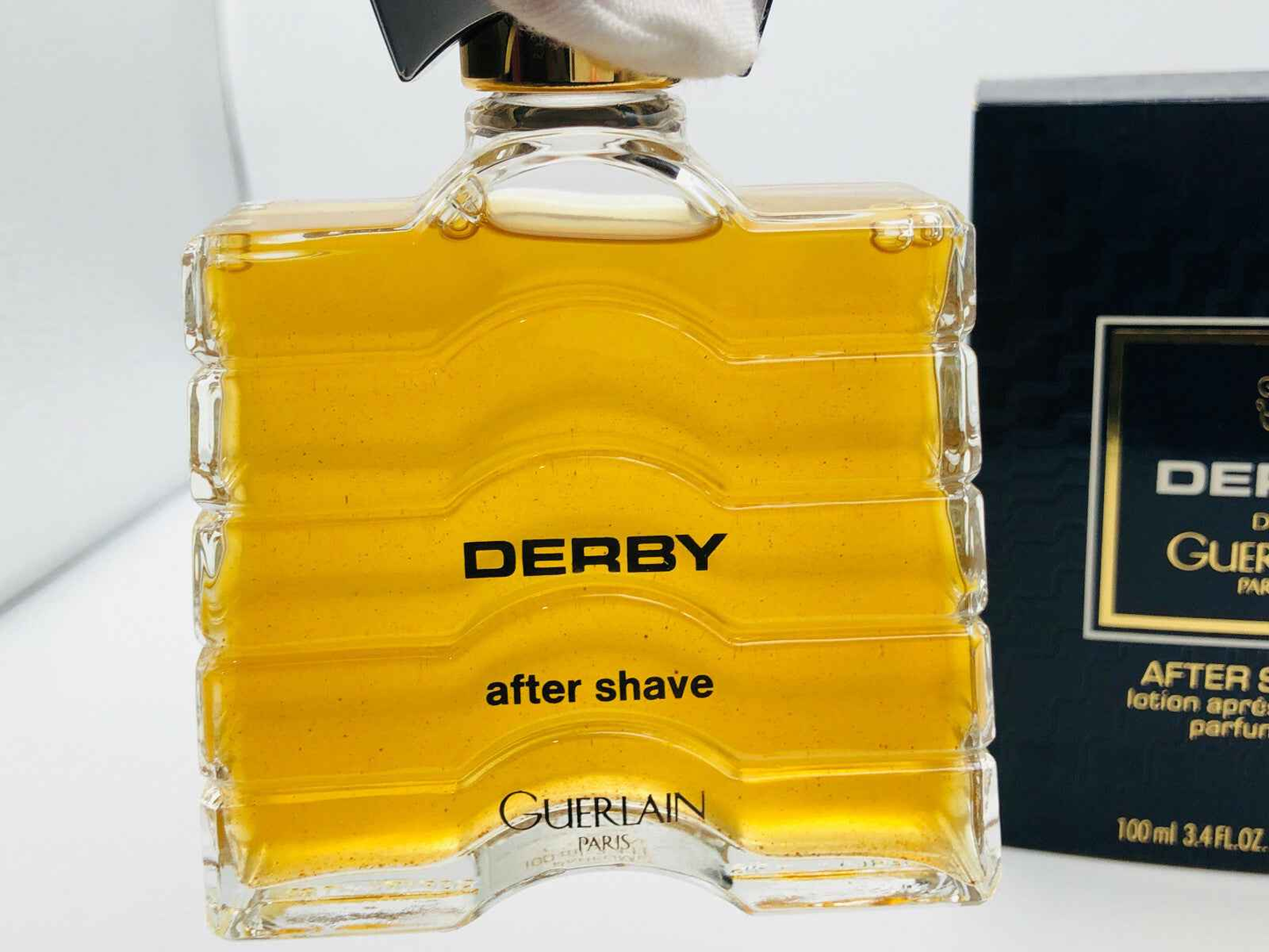 After shave Derby Guerlain in flacone di vetro, profumo maschile dalla fragranza ricca e avvolgente