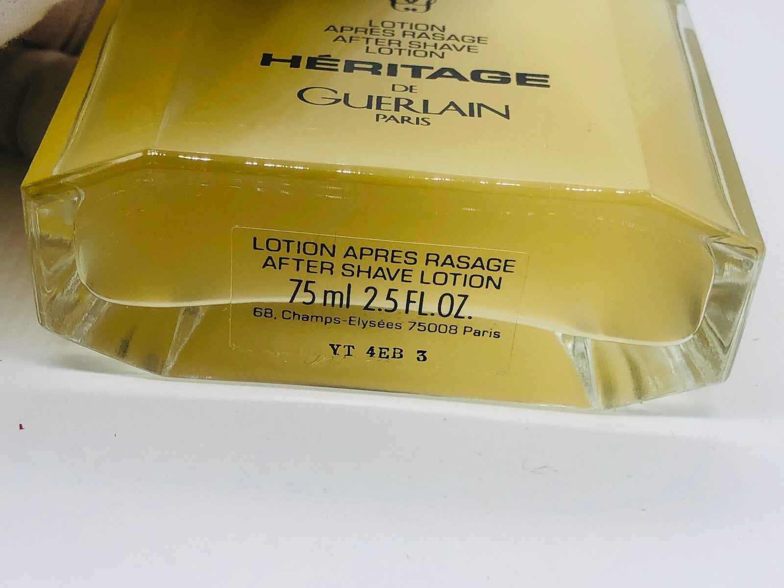 Lozione dopobarba Heritage Guerlain Vintage da 75 ml con elegante confezione in vetro trasparente