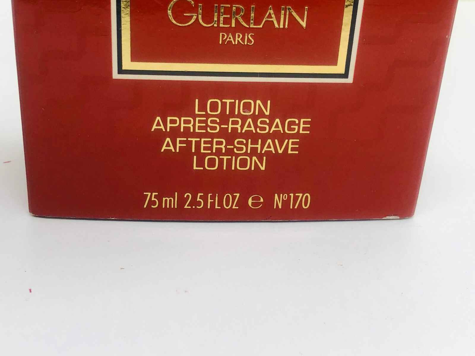 Scatola della Lozione Dopo Barba Heritage Guerlain Vintage da 75 ml con design elegante e dettagli dorati