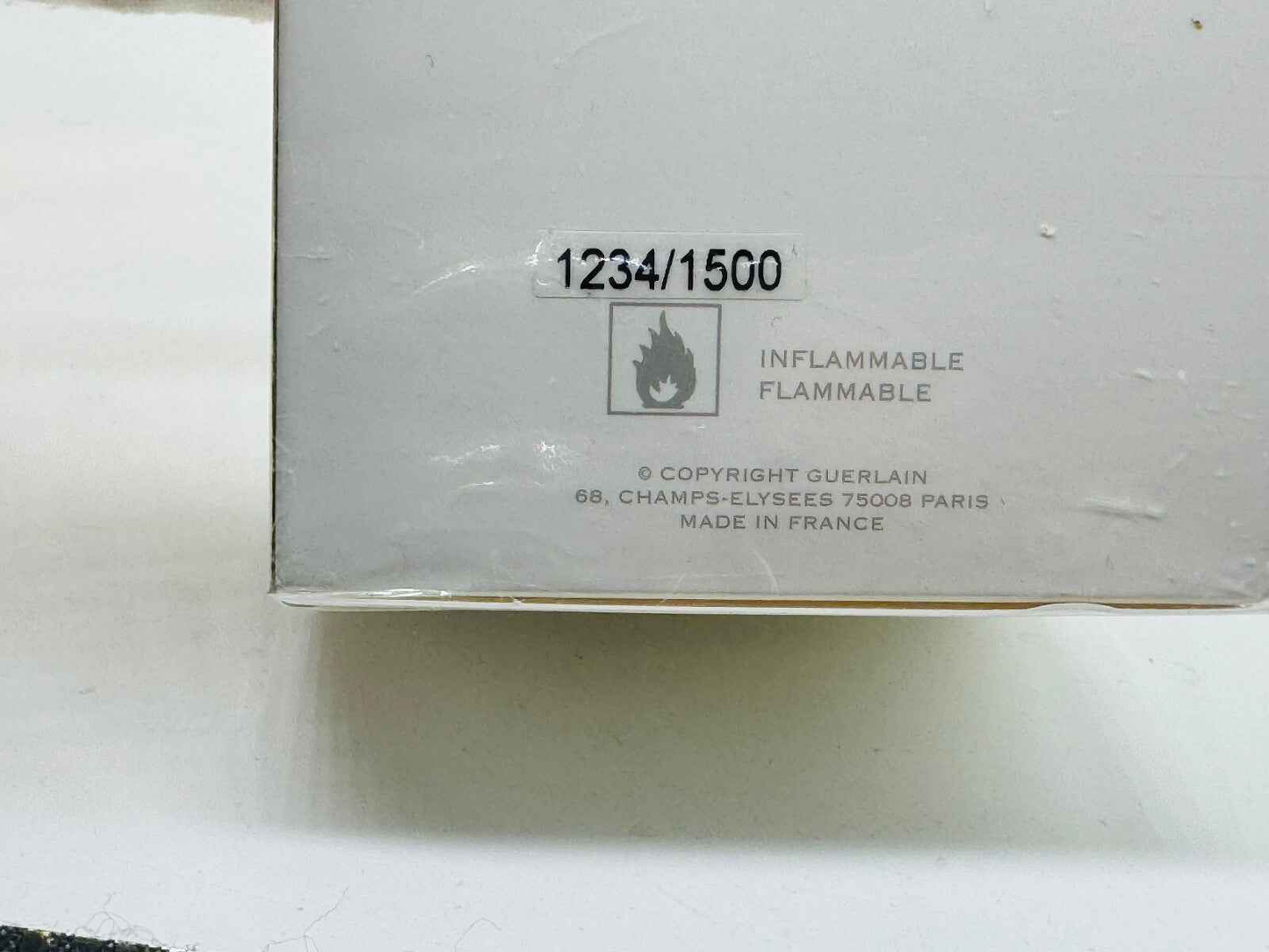 Confezione del profumo Guerlain L'Instant Vintage con numero di serie 1234 su 1500, prodotto in Francia