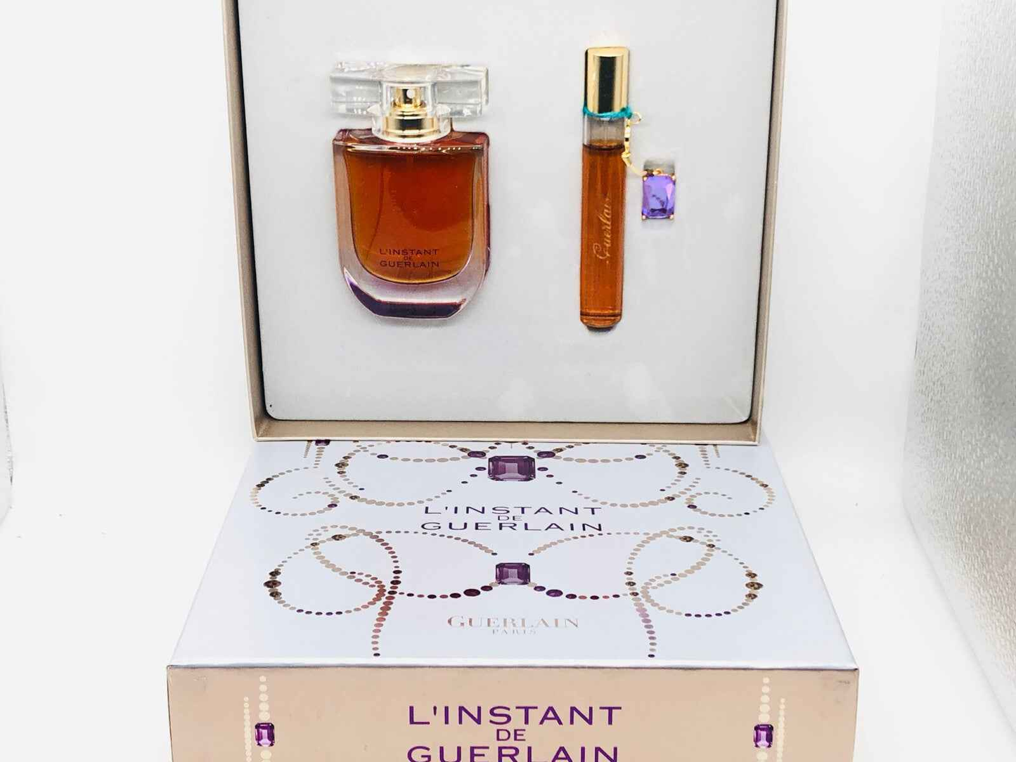 Set regalo di profumo Guerlain L'Instant con flacone e miniatura in confezione elegante